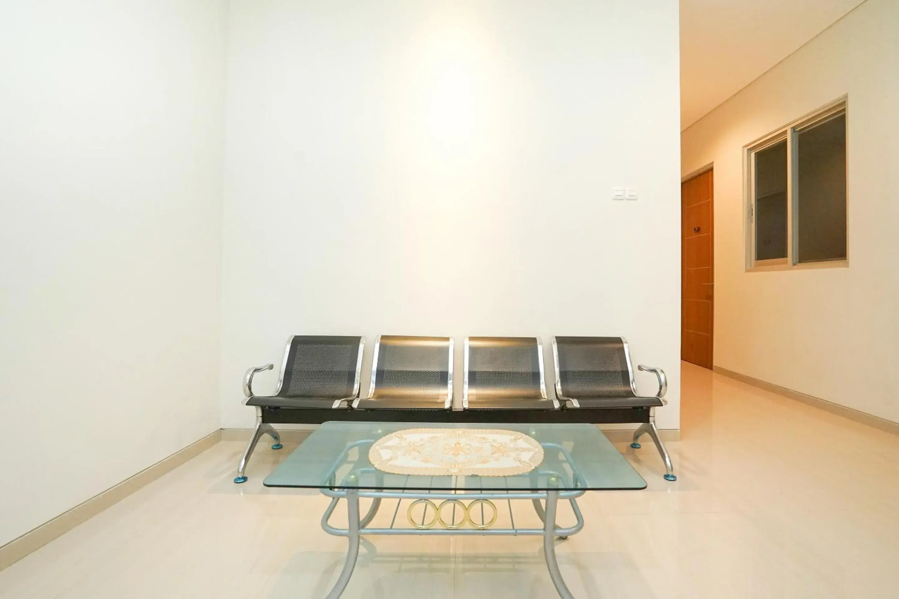 Communal lounge/ TV room in OYO 614 Graha 8 Syariah