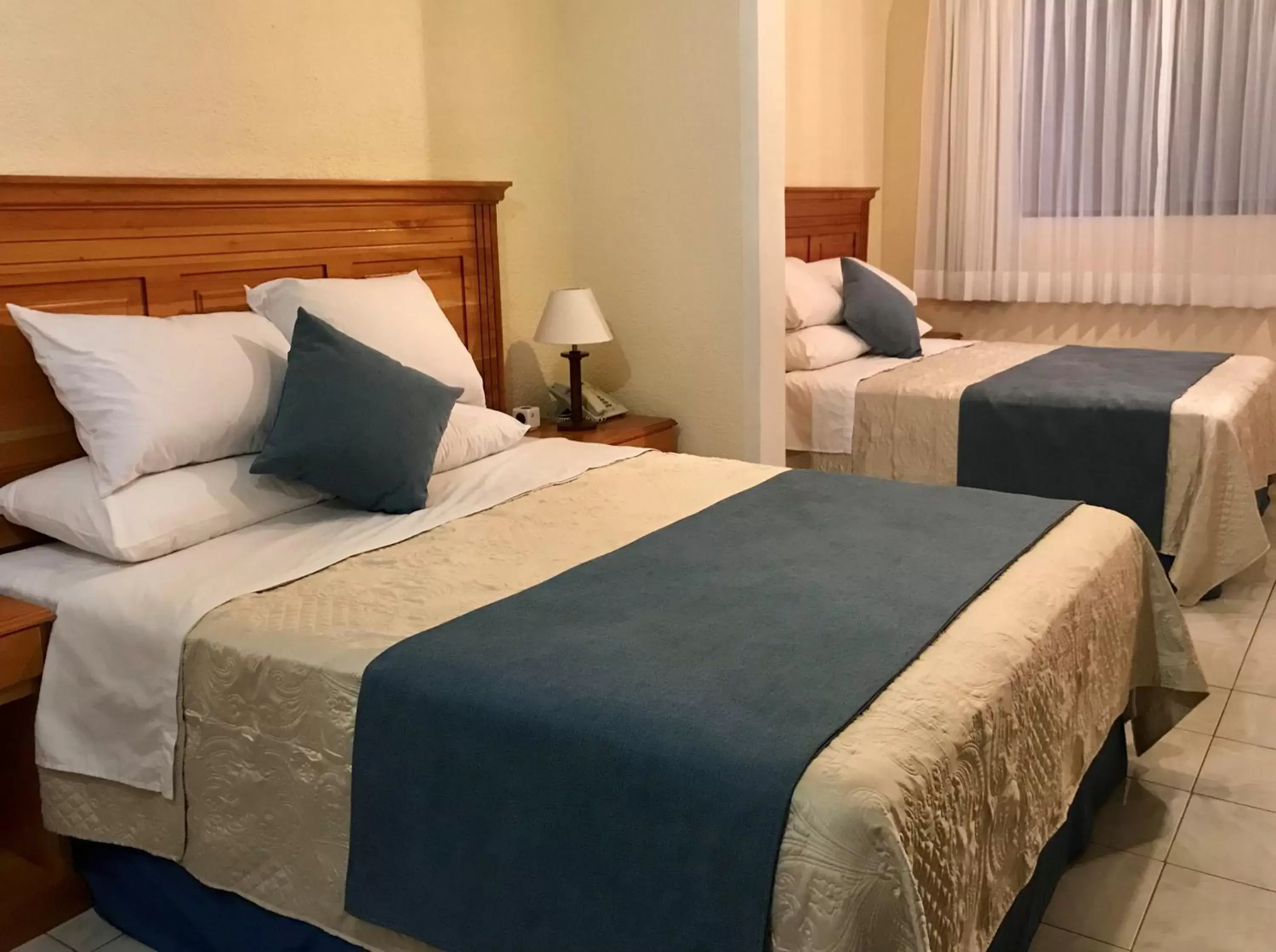 Queen Room with Two Queen Beds in Hotel Belvedere Queen Room with Two Queen Beds in Hotel Belvedere