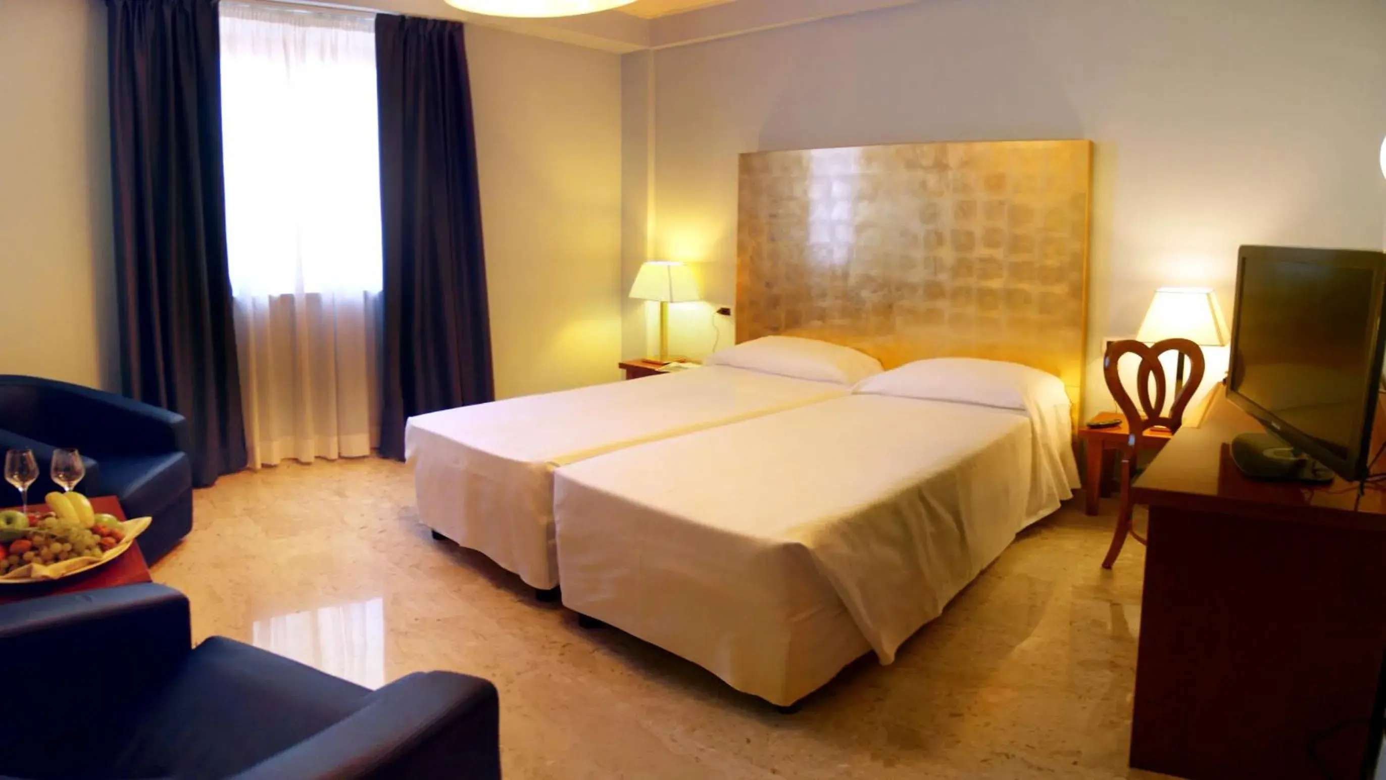 Photo of the whole room, Bed in Hotel Terme Marine Leopoldo Ii