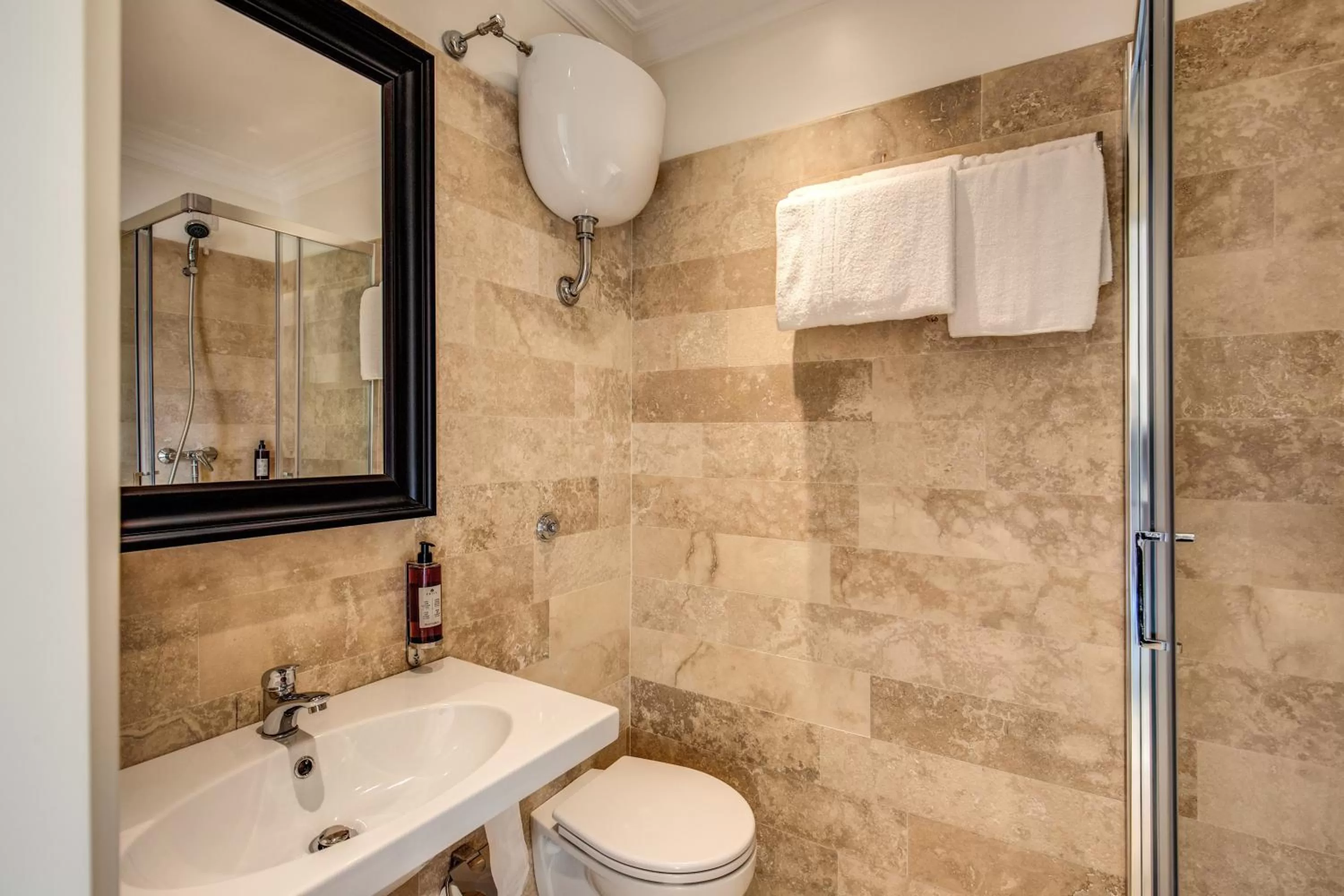 Bathroom in Hotel Domus Mea