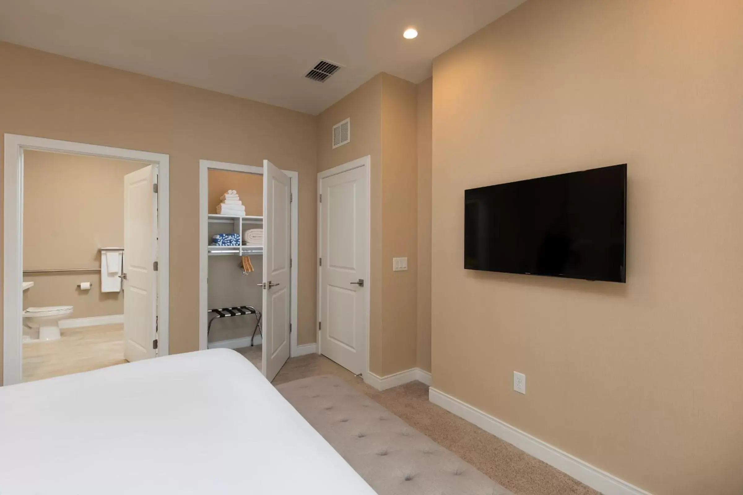 Photo of the whole room, TV/Entertainment Center in Magic Village Yards Trademark Collection by Wyndham