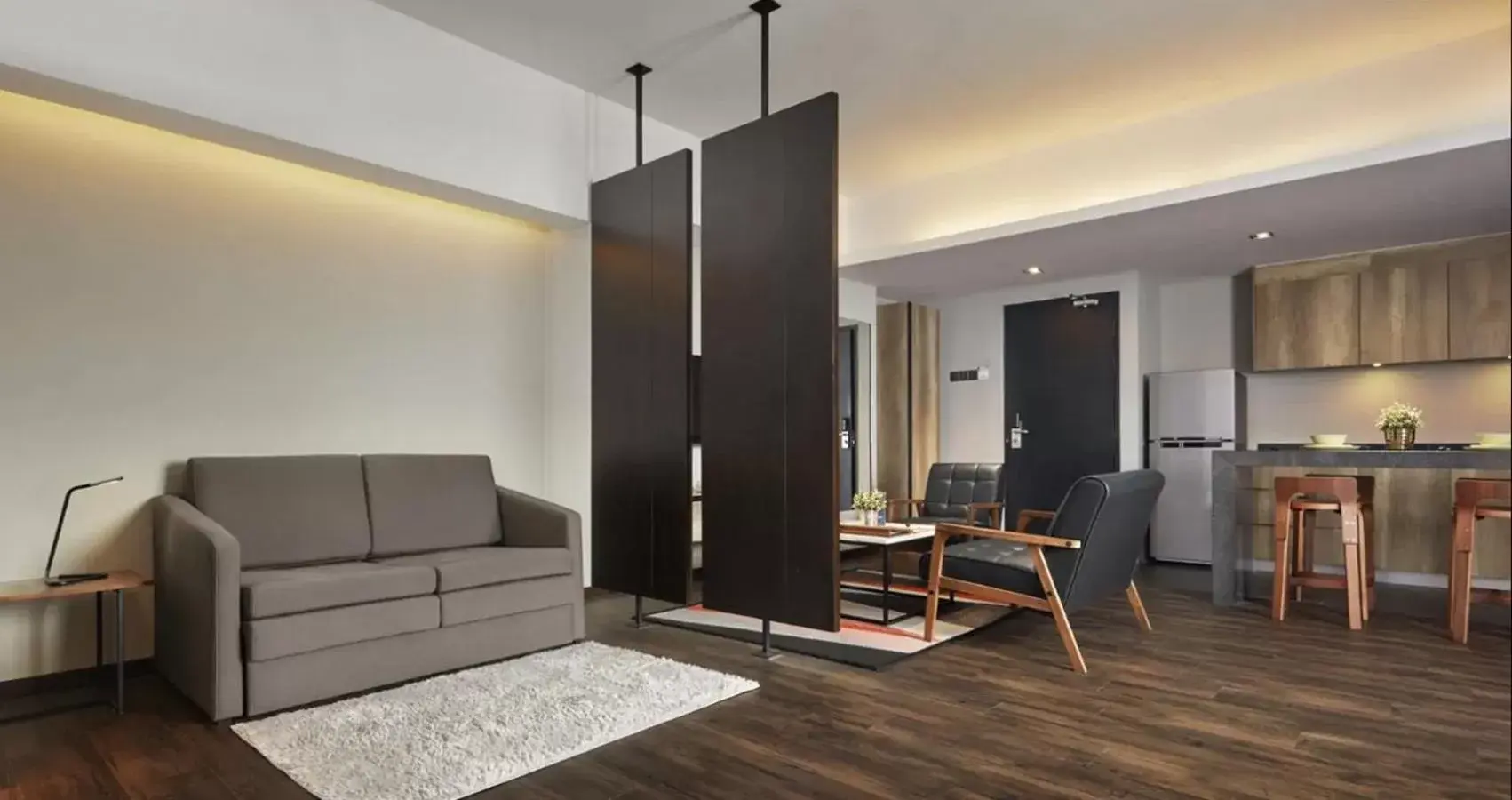 Bed, Seating Area in Tropics Eight Suites Bed, Seating Area in Tropics Eight Suites