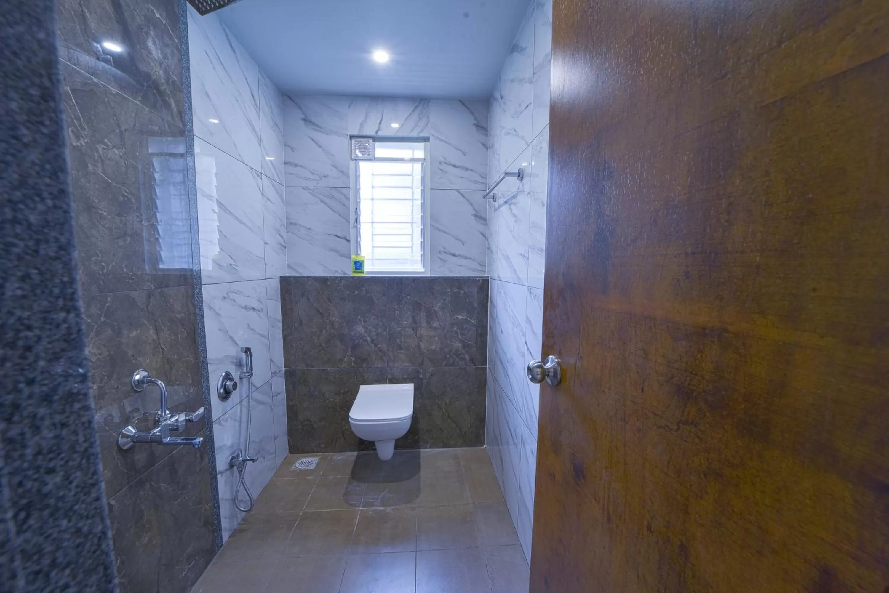 Shower in Hotel TrushaDham Near to Mahalaxmi Temple Kolhapur