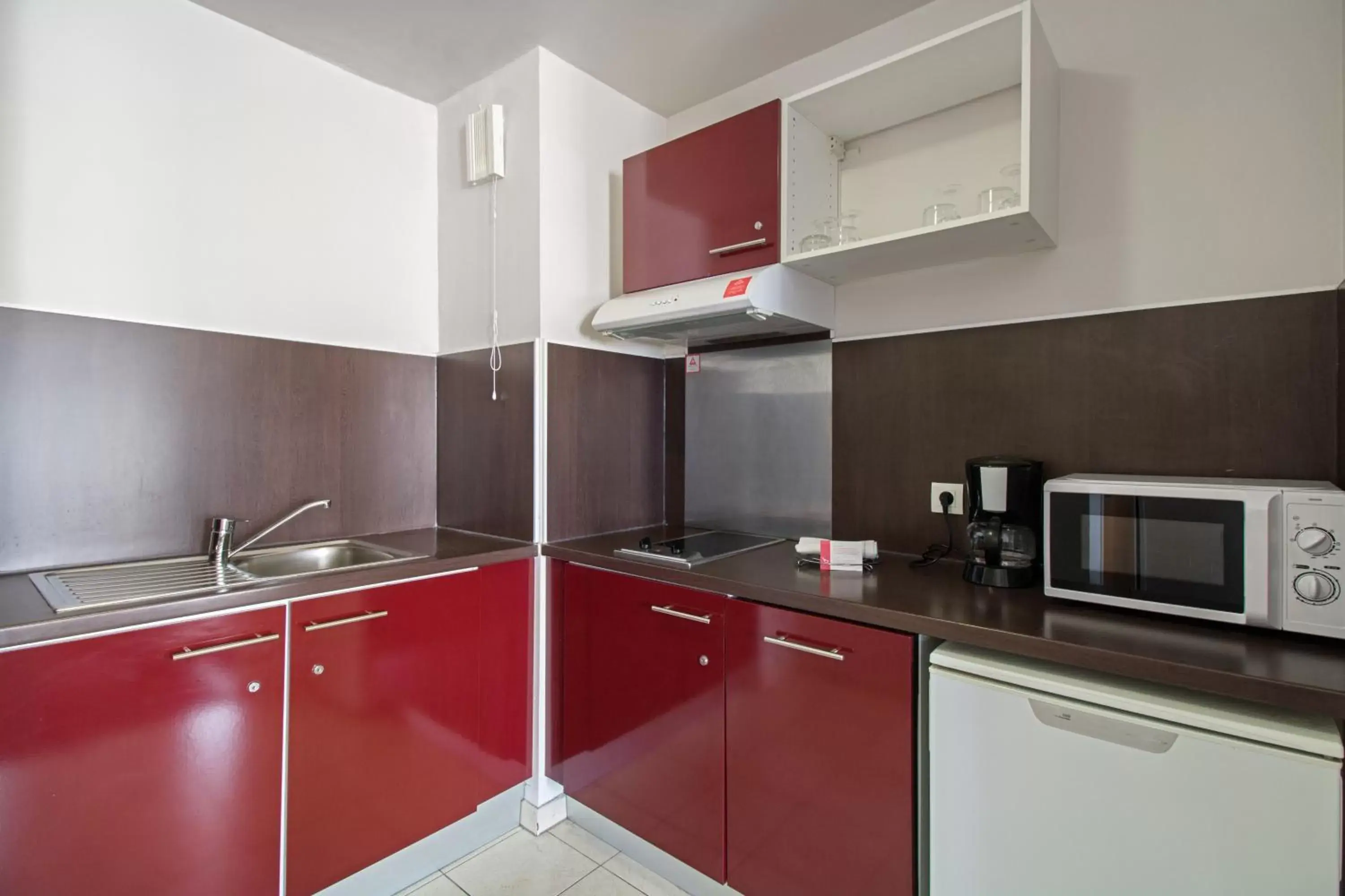 Kitchen or kitchenette, Kitchen/Kitchenette in Appart'City Confort Paris Villejuif (Ex Park&Suites)