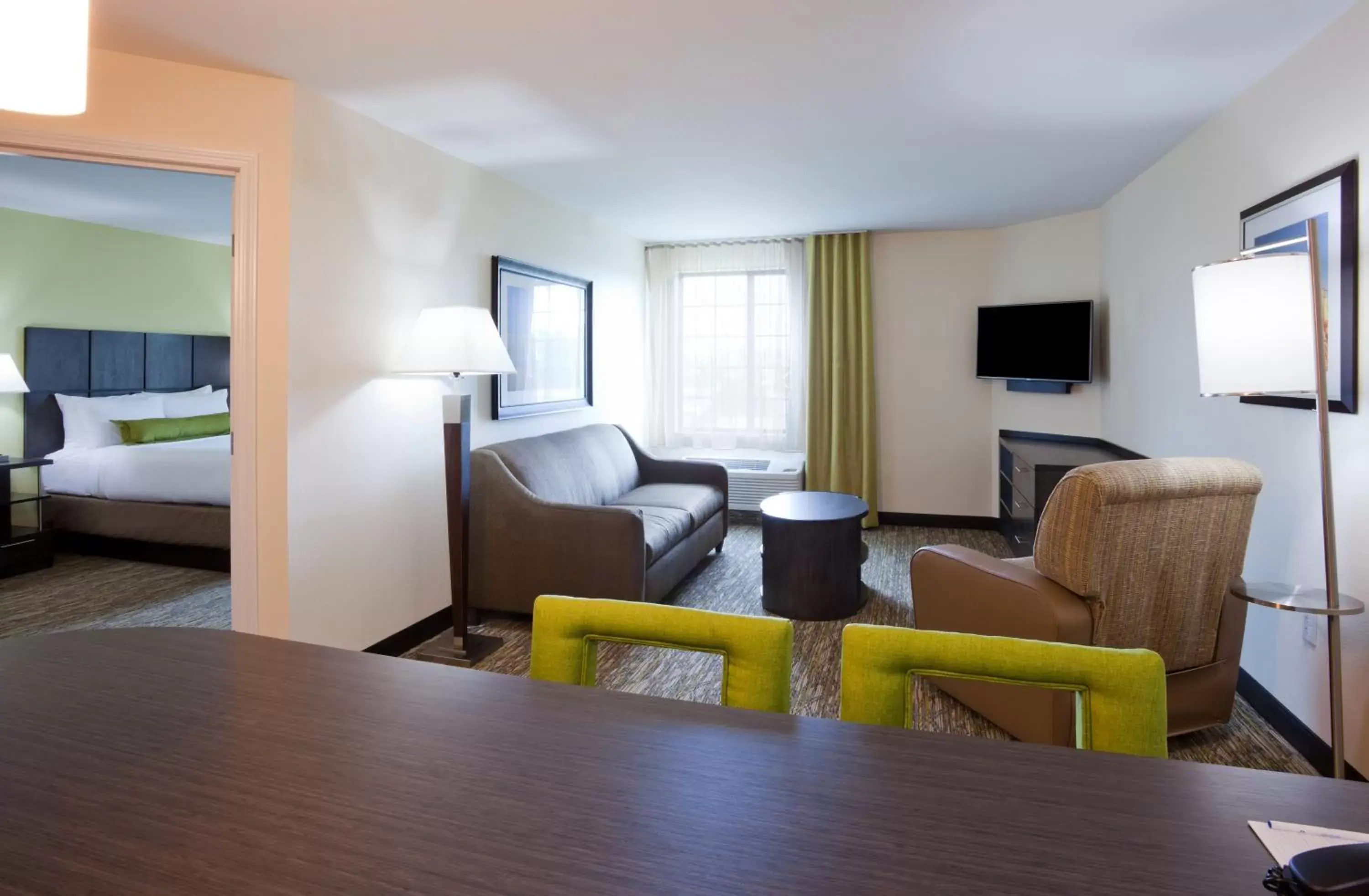 Bedroom, Seating Area in Candlewood Suites Dickinson, an IHG Hotel