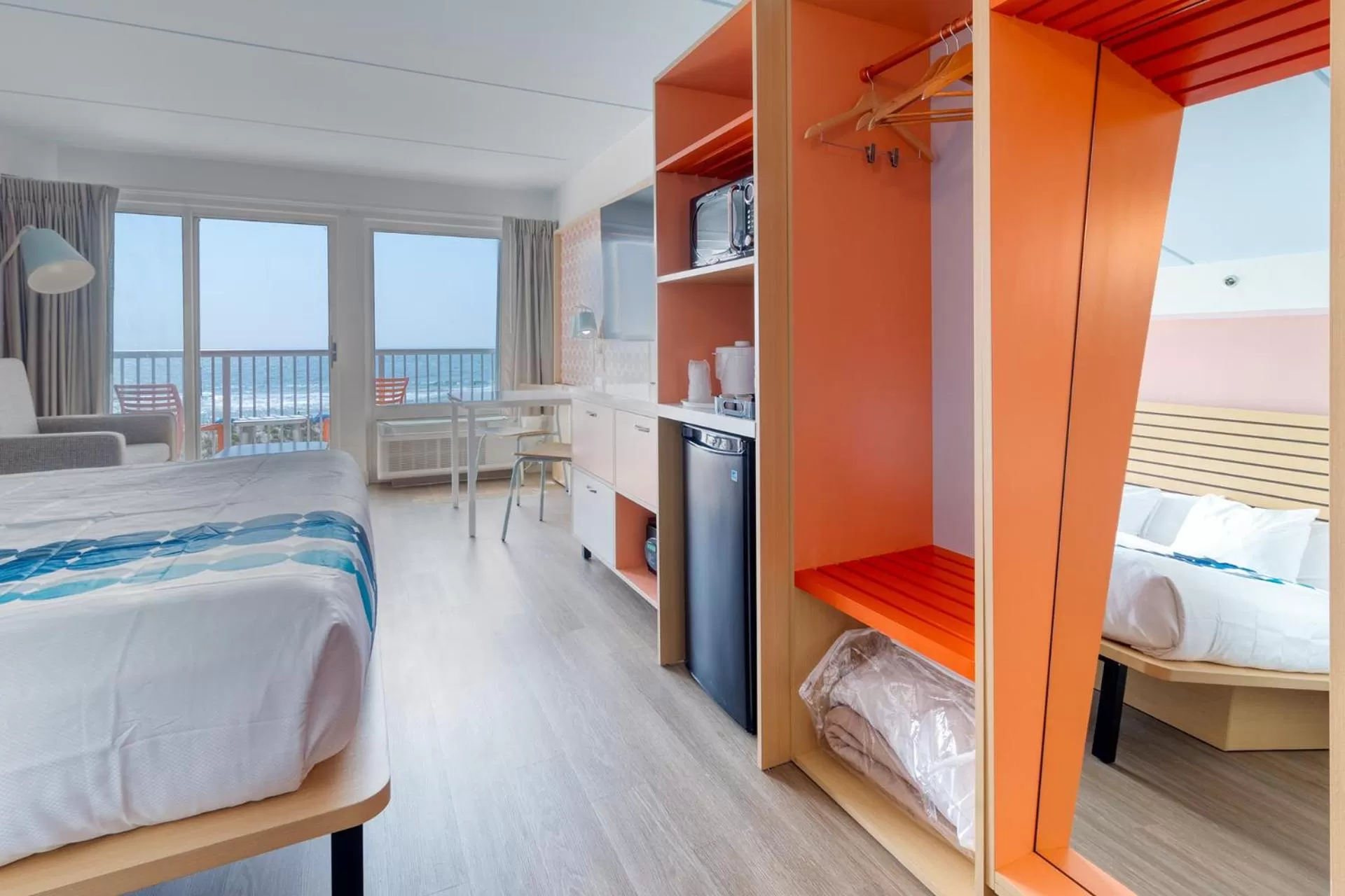 Photo of the whole room, Bed in Golden Sands Carolina Beach Oceanfront, Tapestry by Hilton