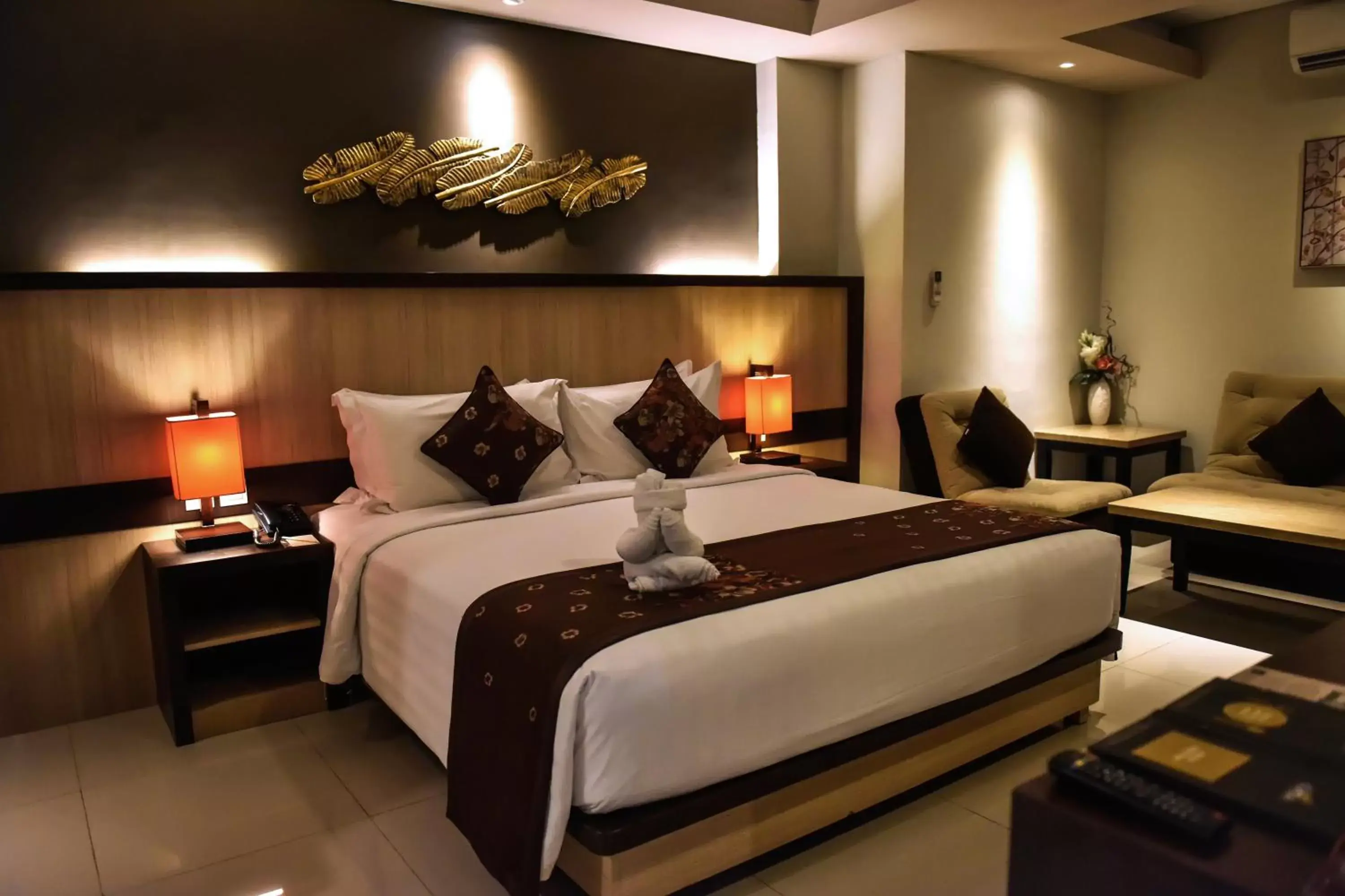 Bed in The Kana Kuta Hotel