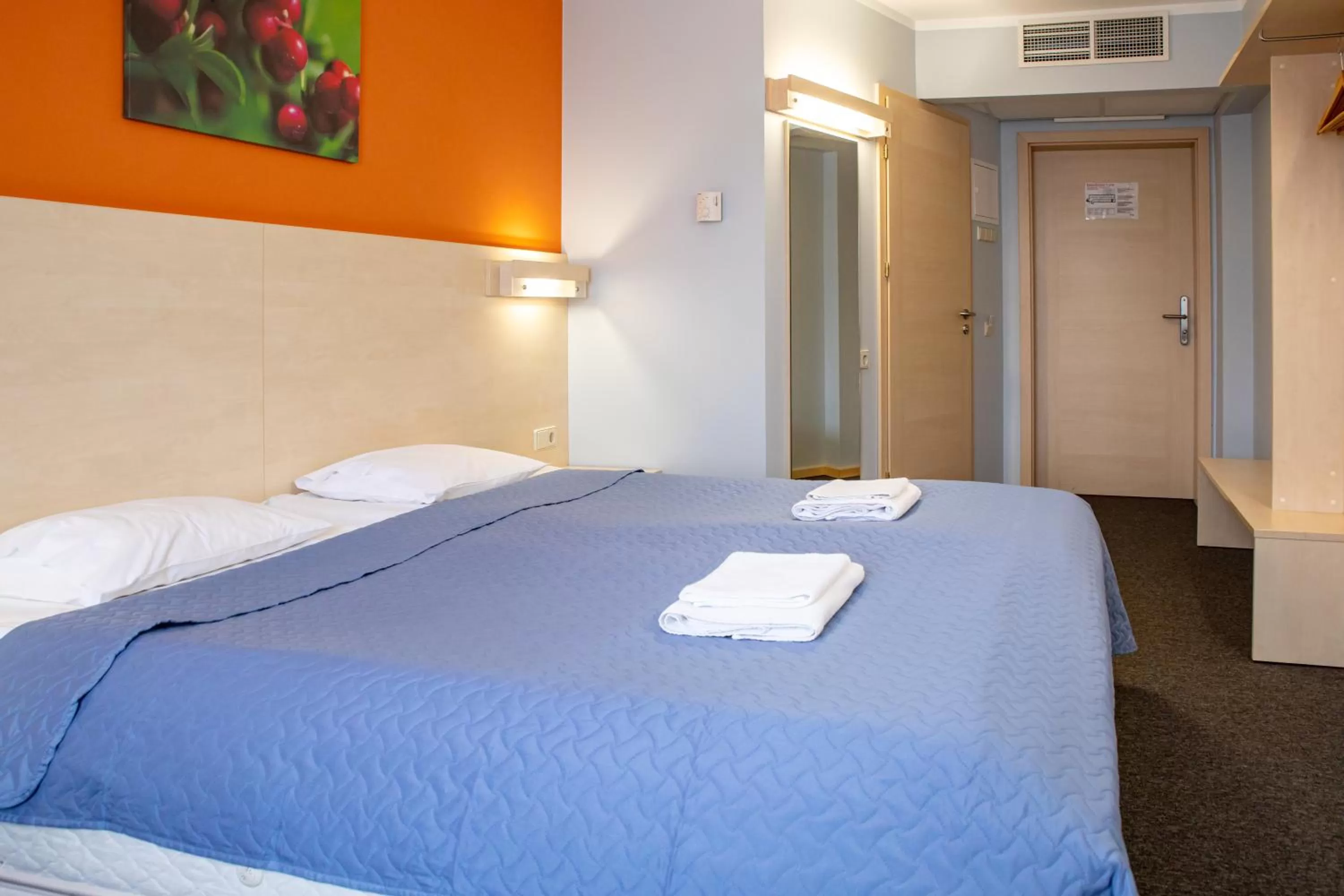 Bed in Rija Bauska Hotel