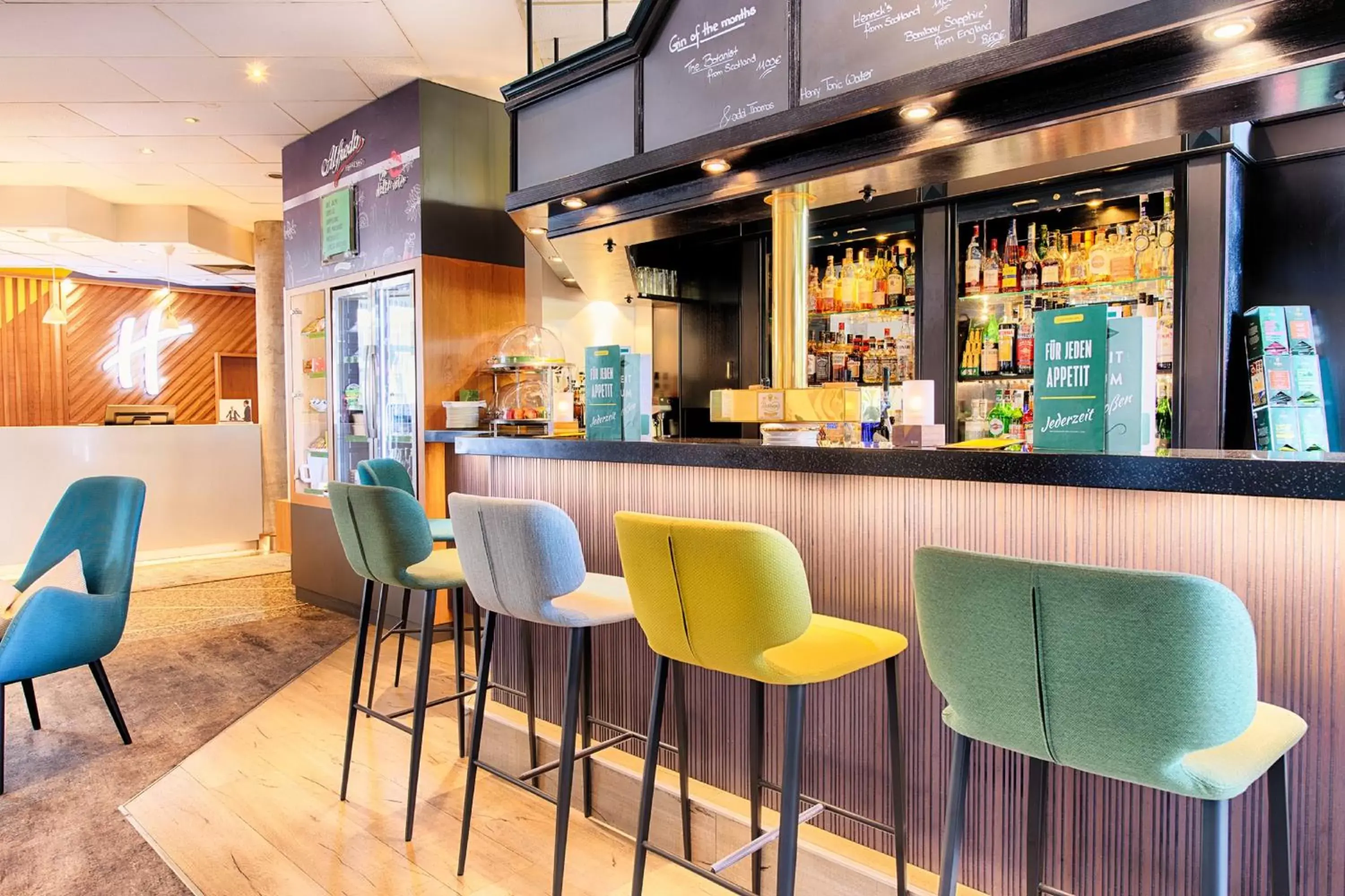 Lounge or bar in Holiday Inn Munich - South by IHG Lounge or bar in Holiday Inn Munich - South by IHG