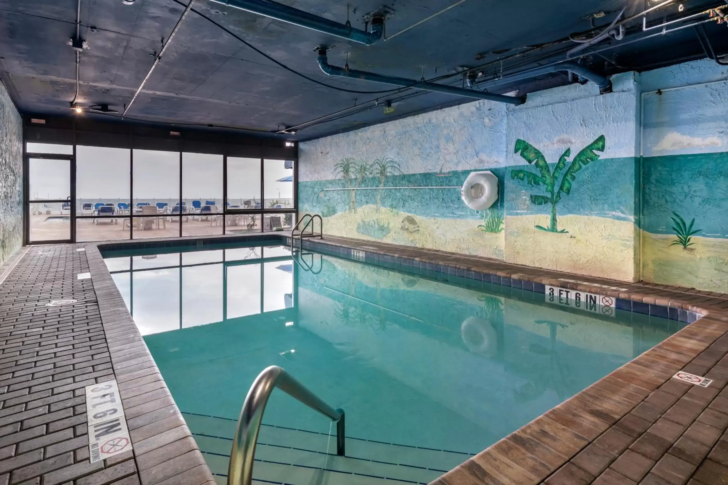 Swimming Pool in Tropical Winds Resort Hotel