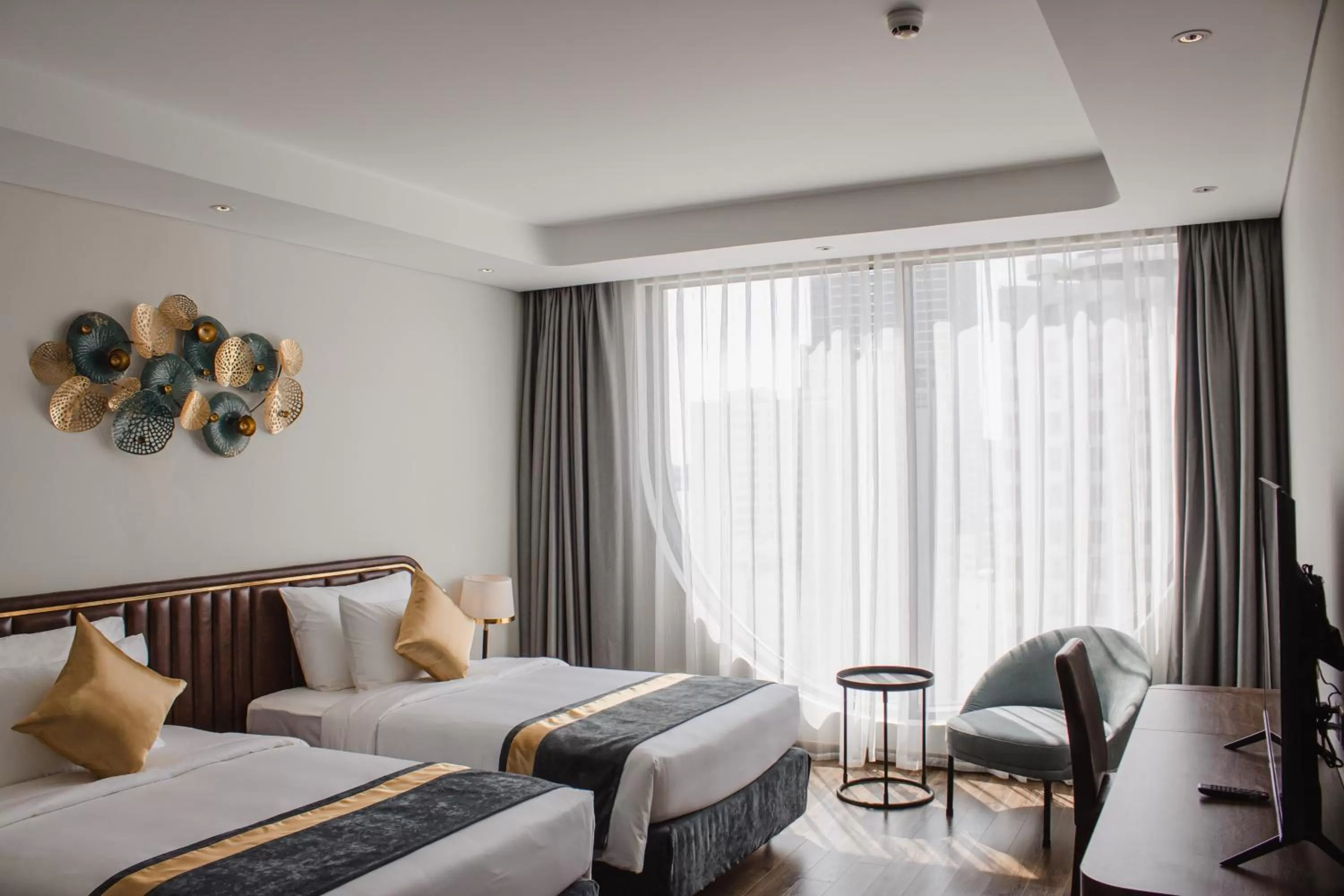 TV and multimedia, Bed in Grand Tourane Nha Trang Hotel