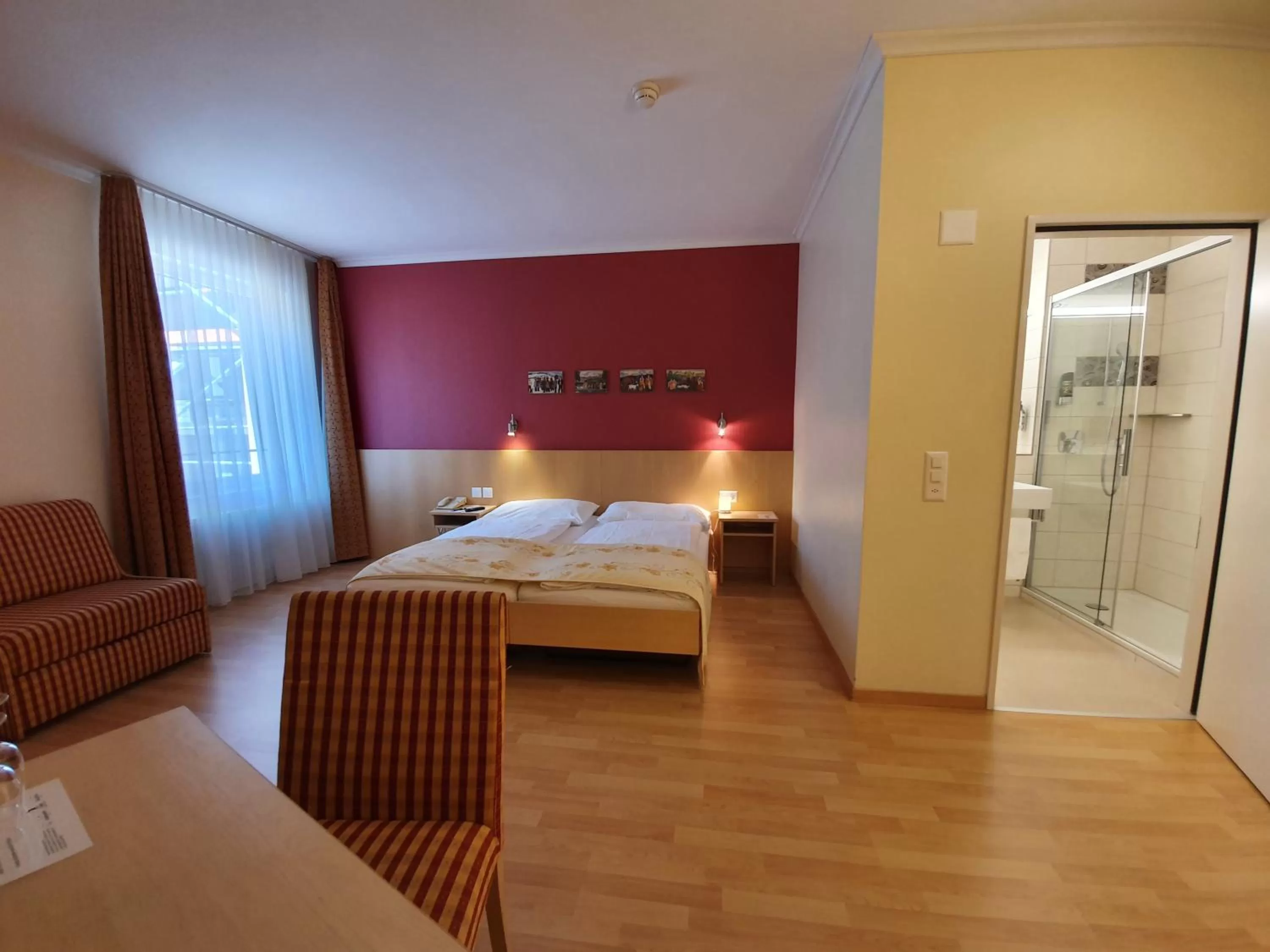 Photo of the whole room, Bed in Ambassador Self Check-in Hotel