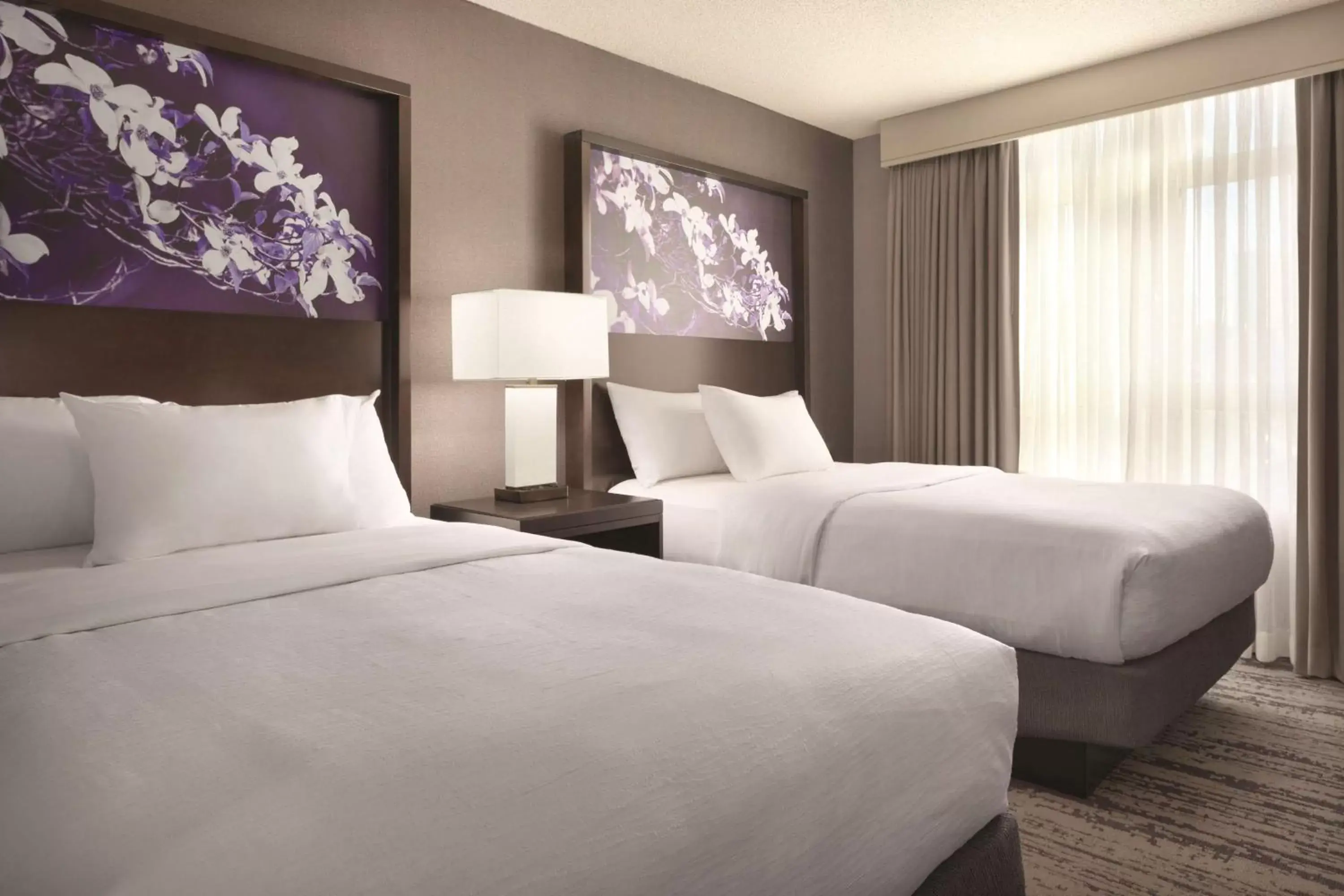 Bed in Embassy Suites by Hilton Atlanta at Centennial Olympic Park