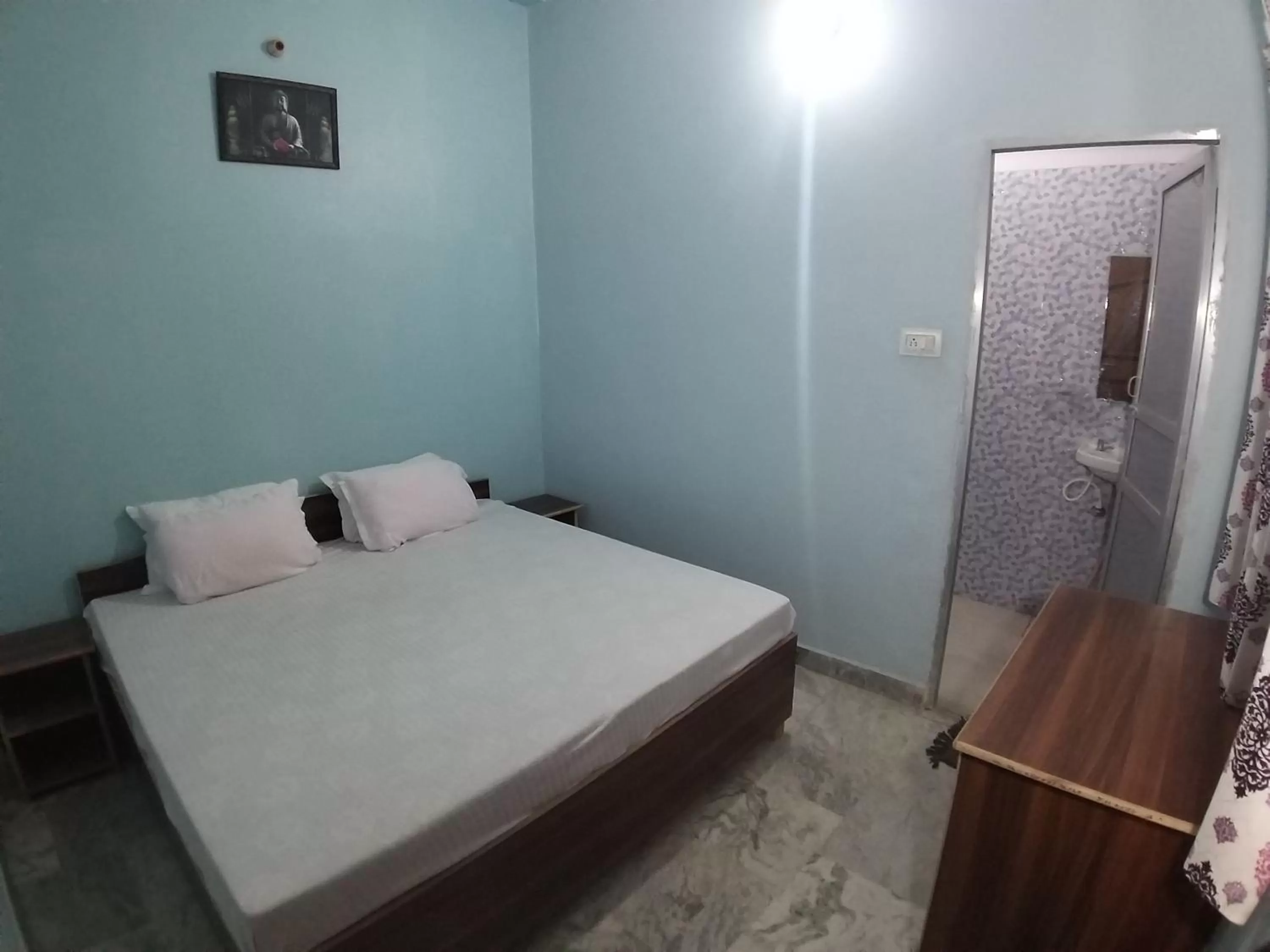 Bed in Mahamaya Paying Guest House