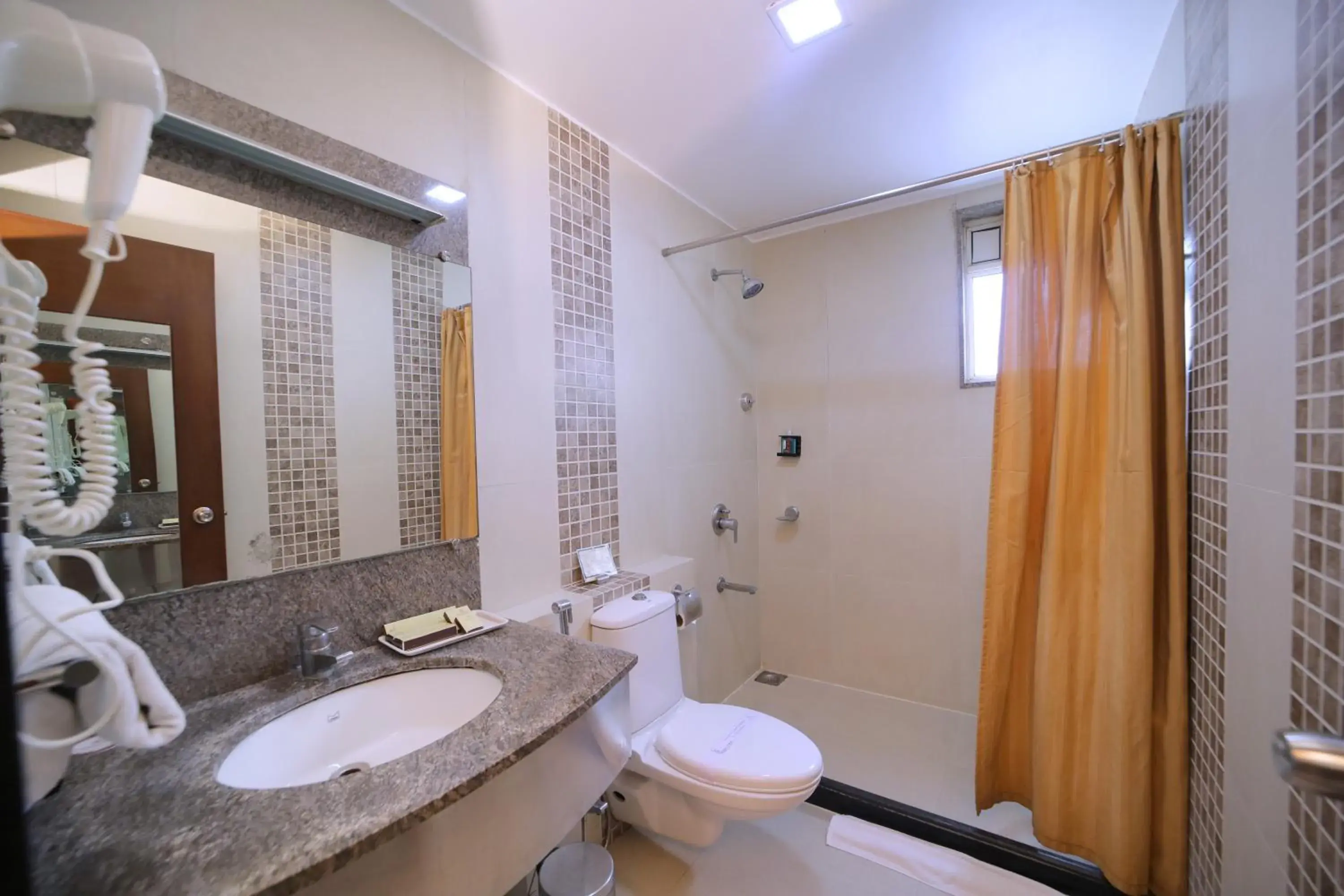 Bathroom in Amantra Comfort Hotel