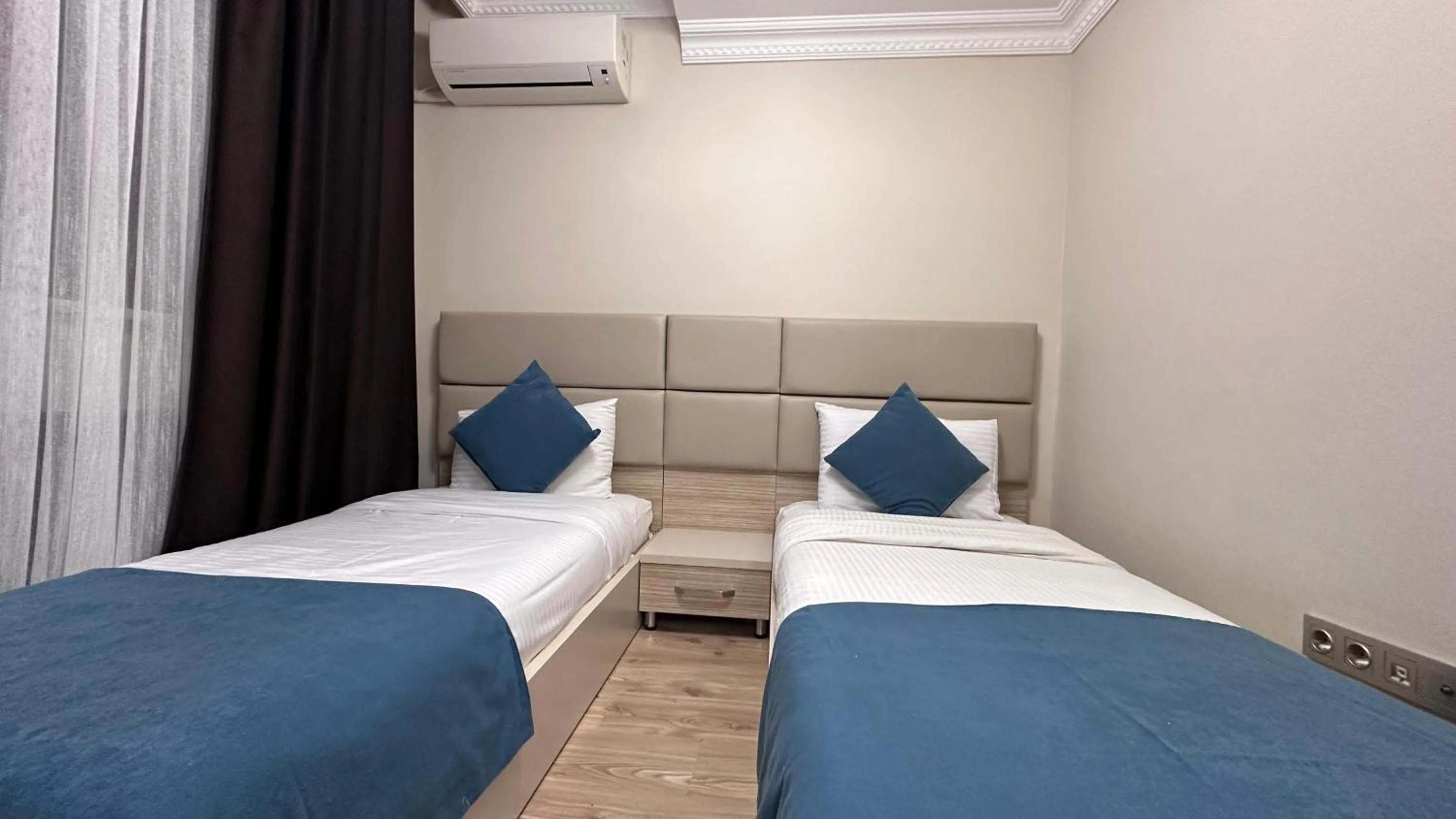 Bed in Overland Residence