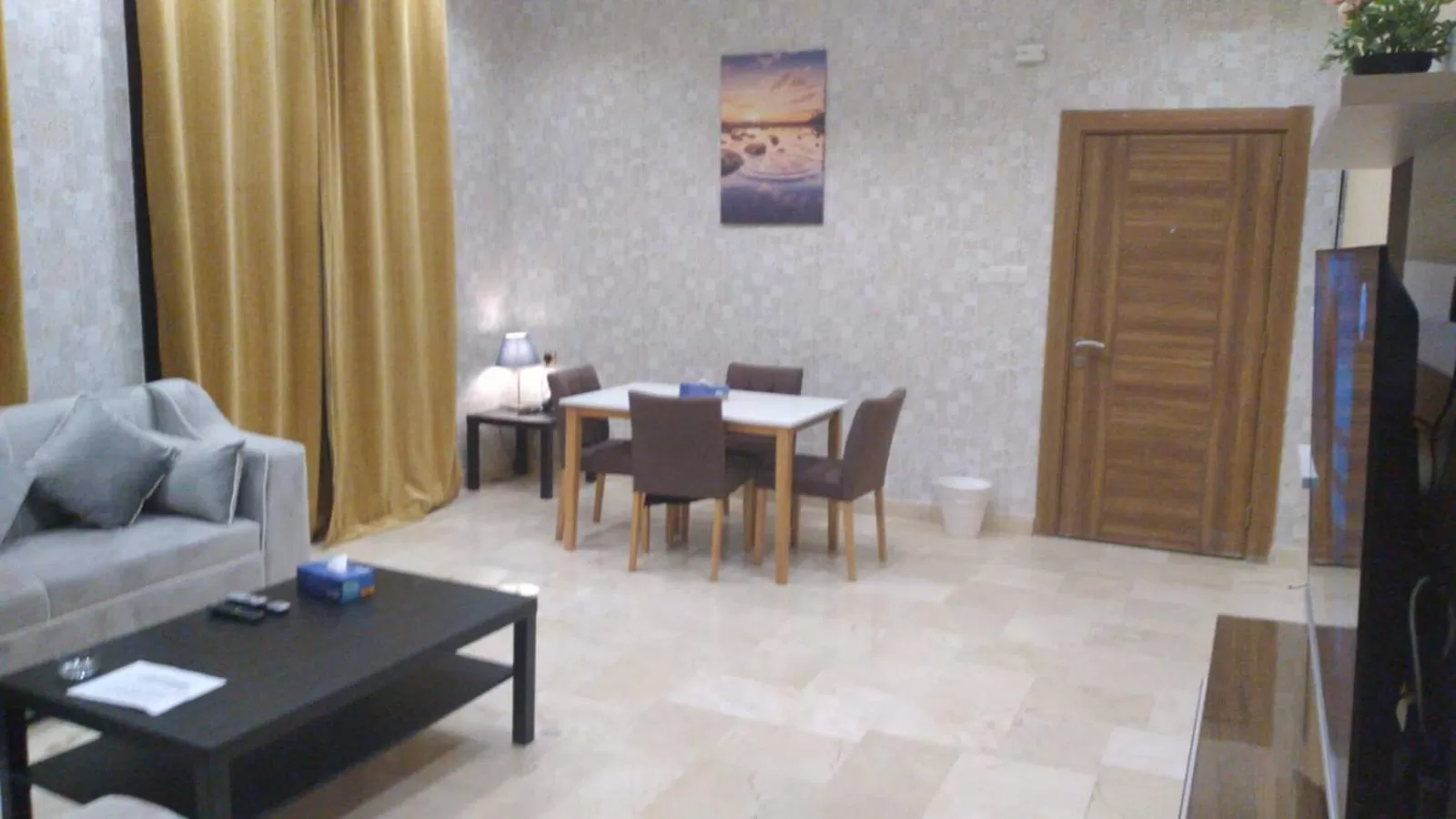 TV and multimedia, Seating Area in Rihanna Hotel Apartment