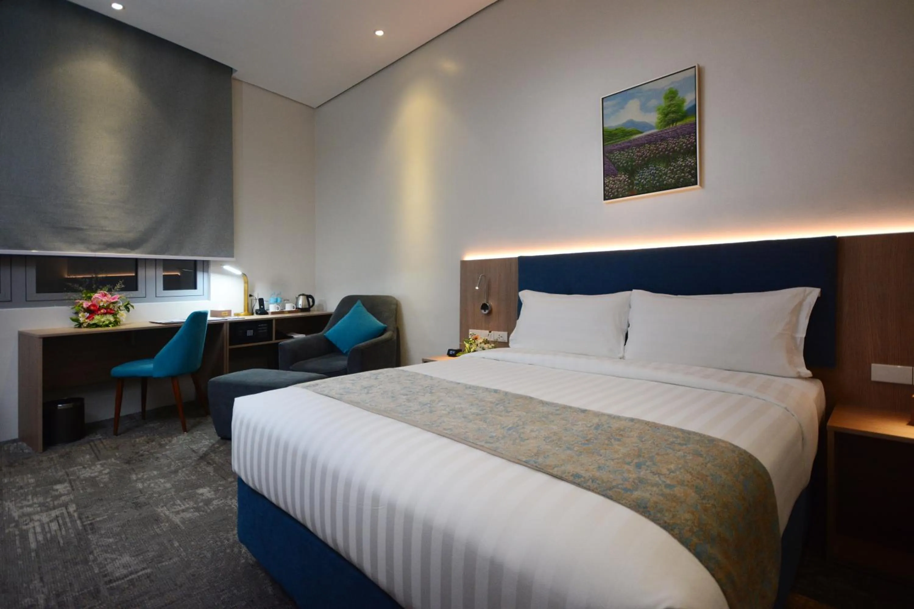 Bed in Blue Lotus Hotel