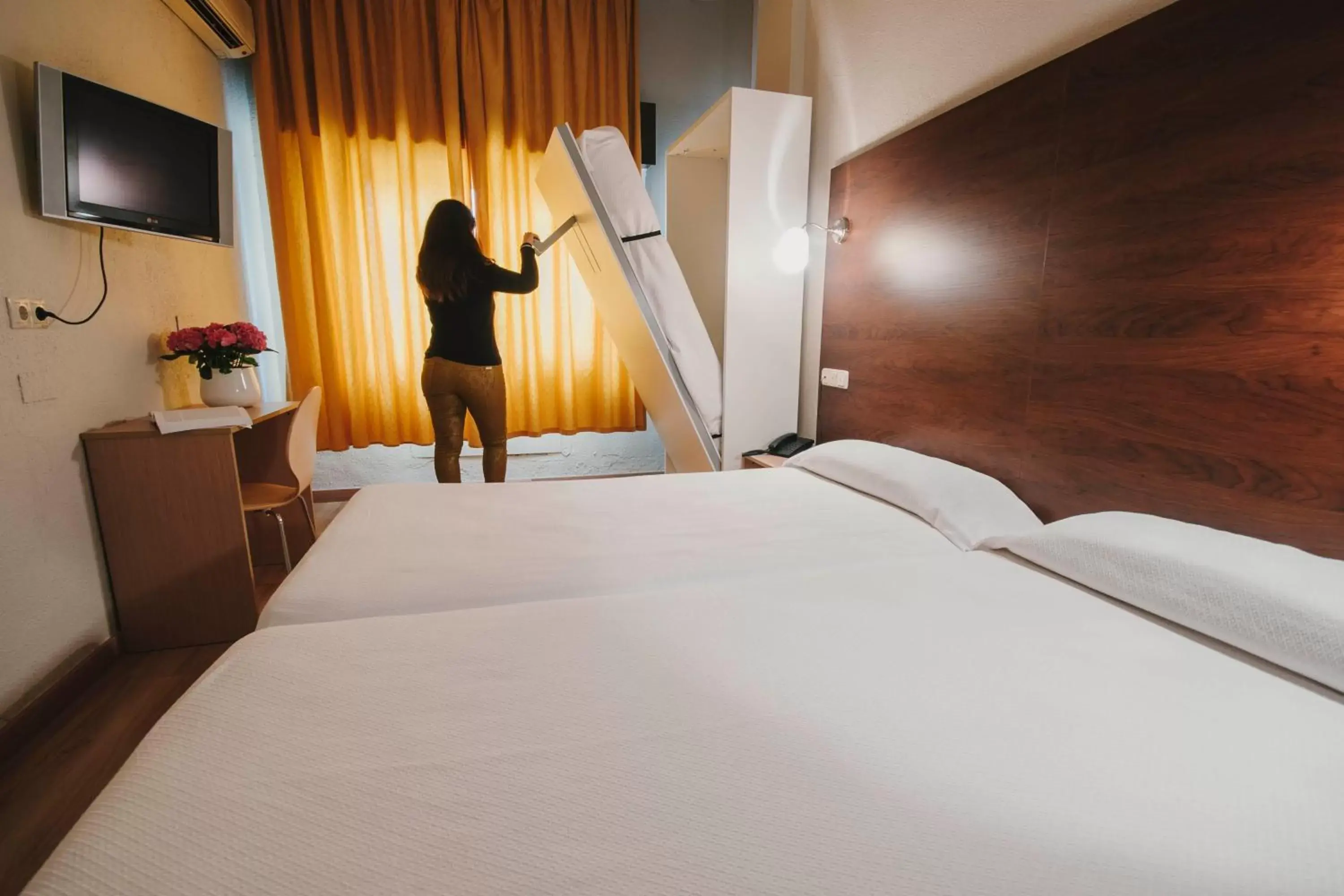 Bed in Hotel Embajador