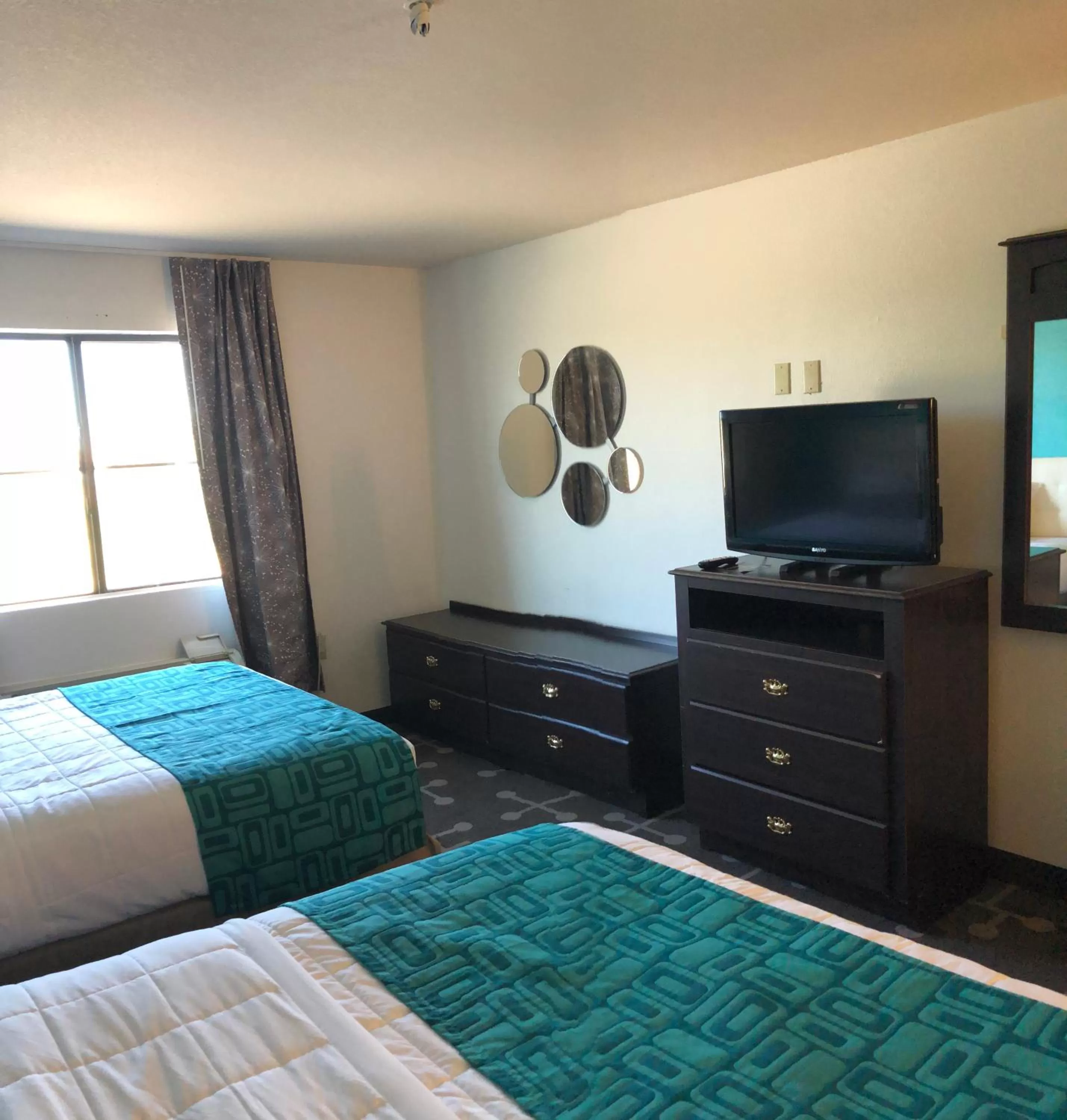Bed in Howard Johnson by Wyndham Lubbock TX