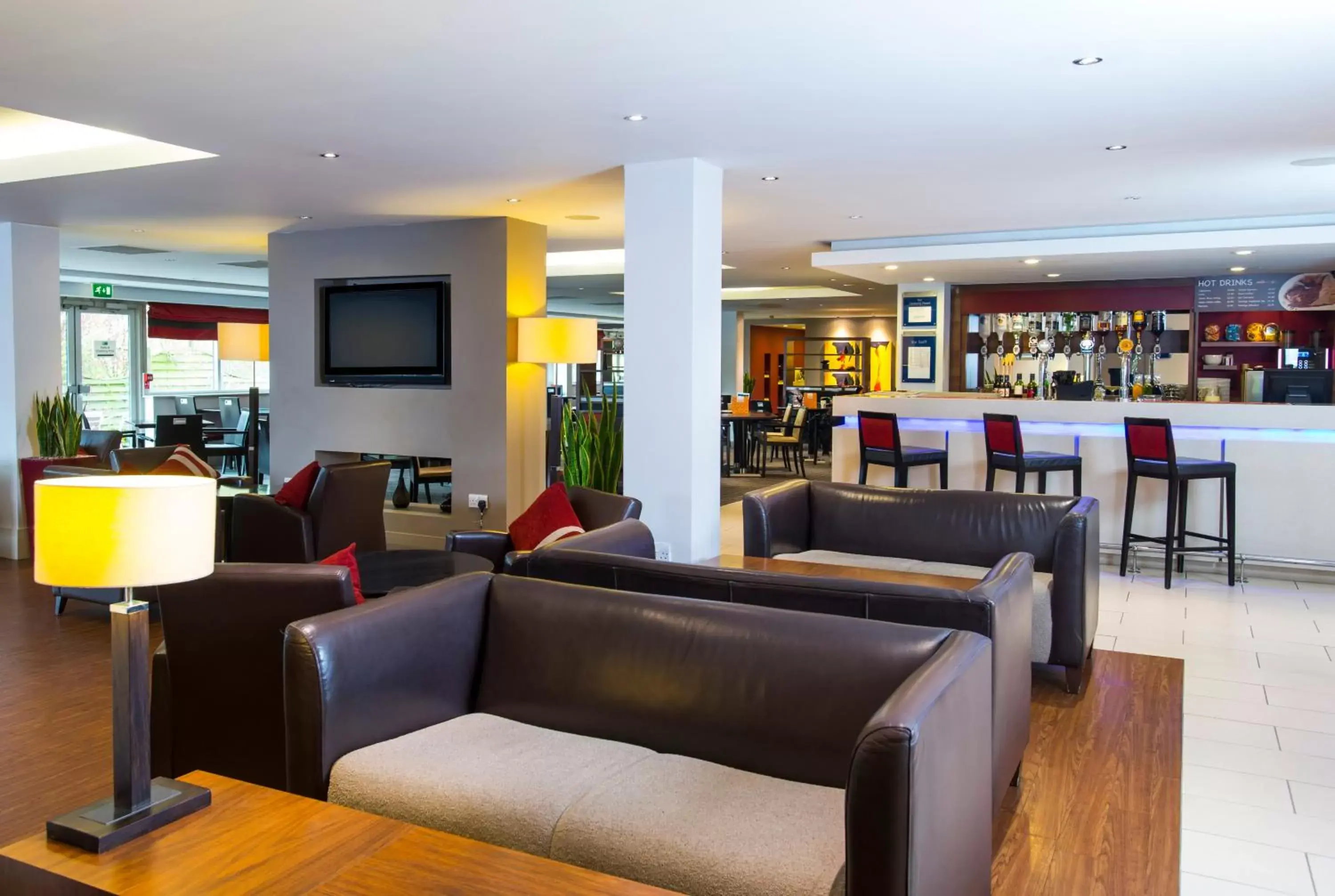 Lounge or bar, Lounge/Bar in Holiday Inn Express Northampton - South, an IHG Hotel