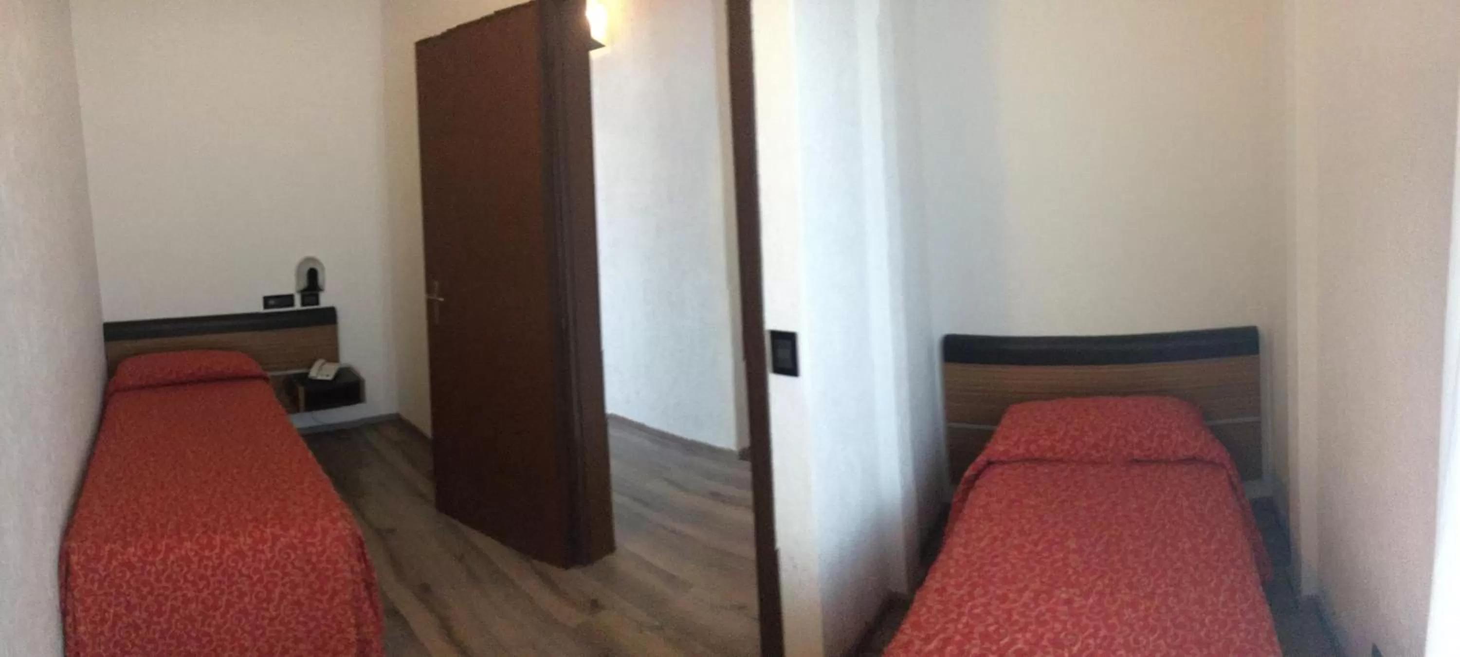 Bed in Albergo Valle d'Oro