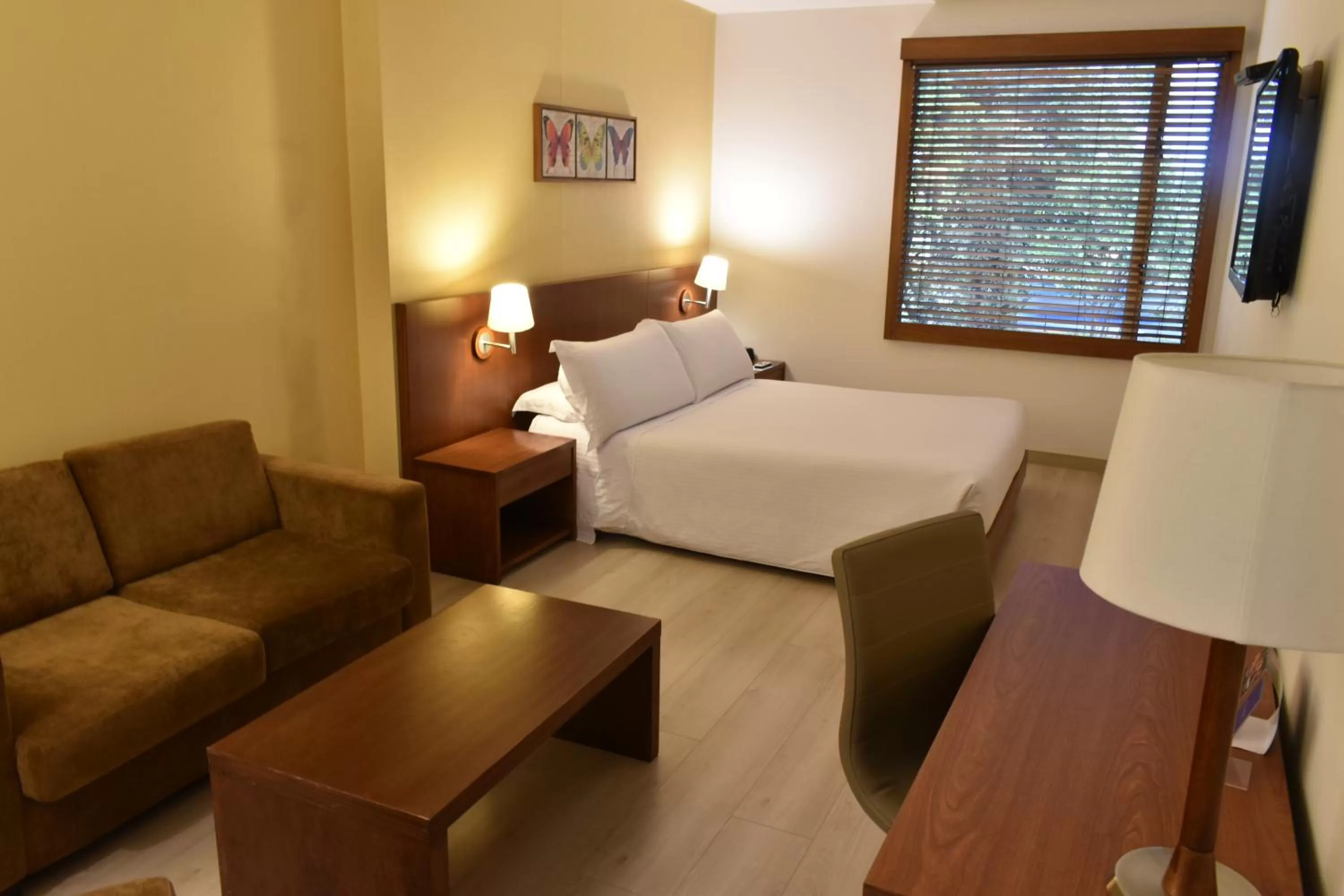 Living room, Bed in Hotel Habitel Select