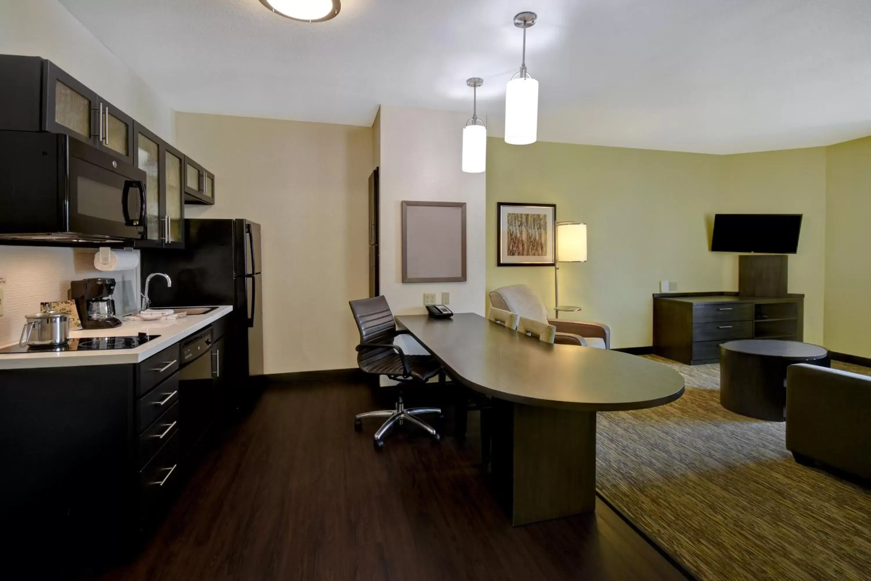 Photo of the whole room, Kitchen/Kitchenette in Candlewood Suites St Clairsville Wheeling Area, an IHG Hotel