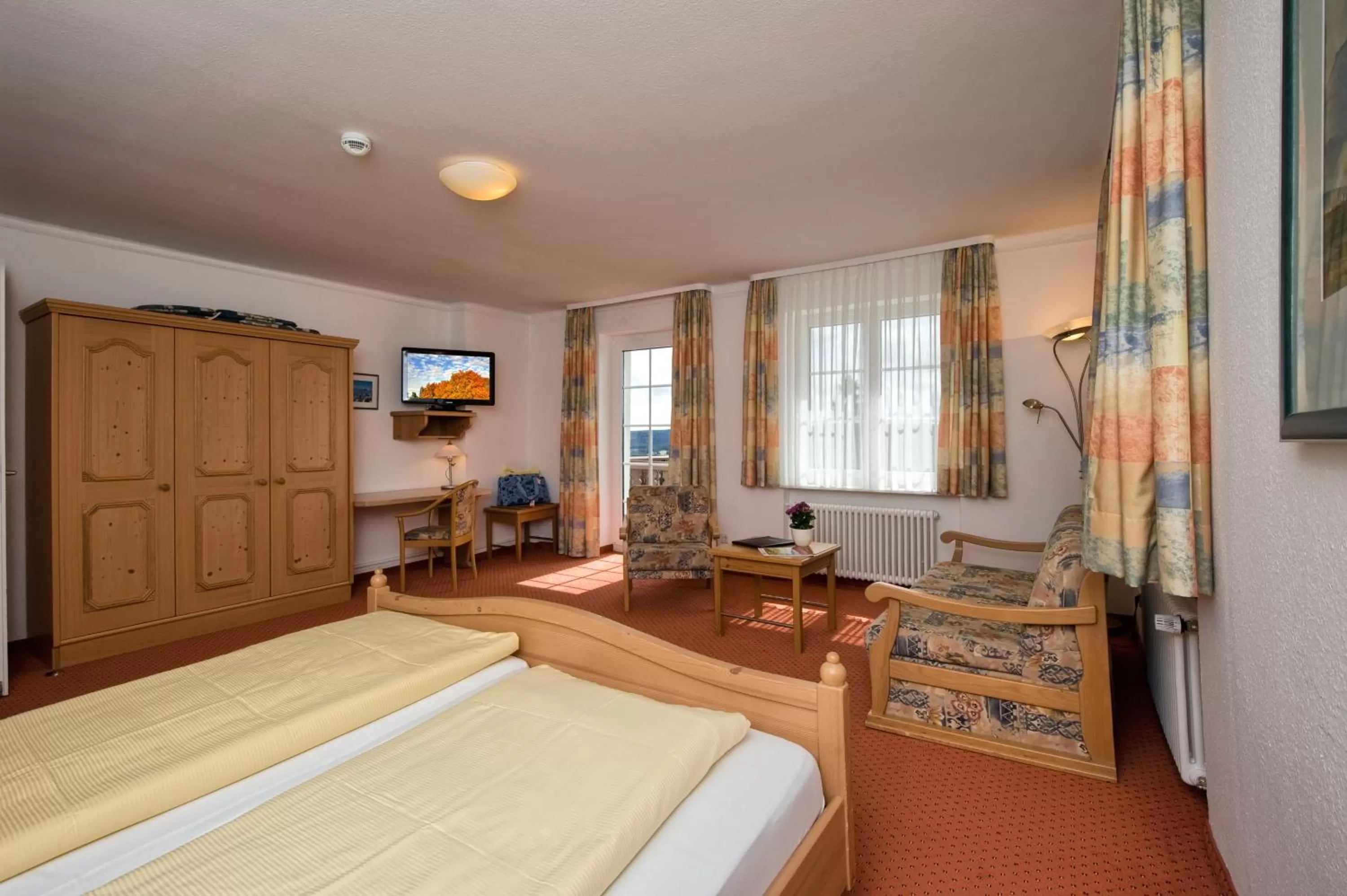 Photo of the whole room, Bed in JUFA Hotel Schwarzwald