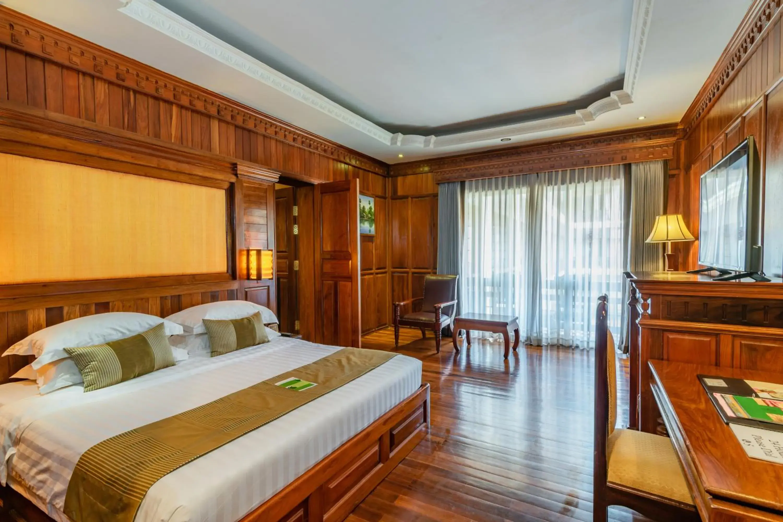 Bed in Empress Angkor Resort & Spa