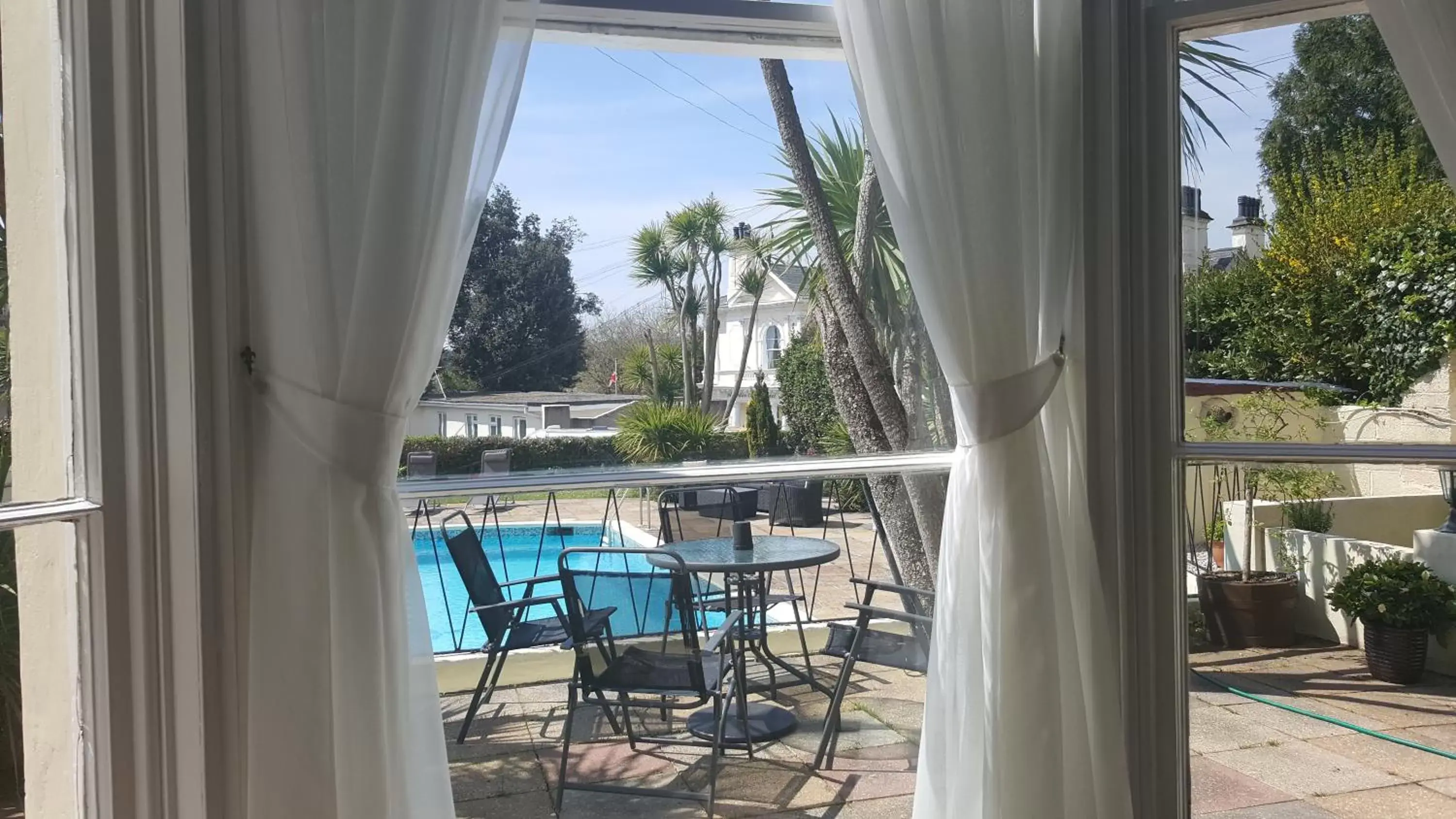 Patio, Pool View in The Devon Court