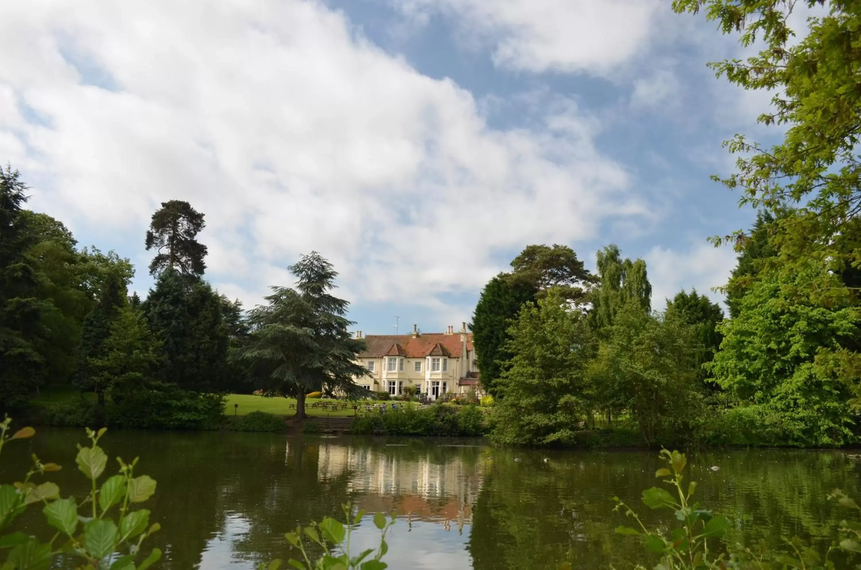 Property building in Worplesdon Place Hotel