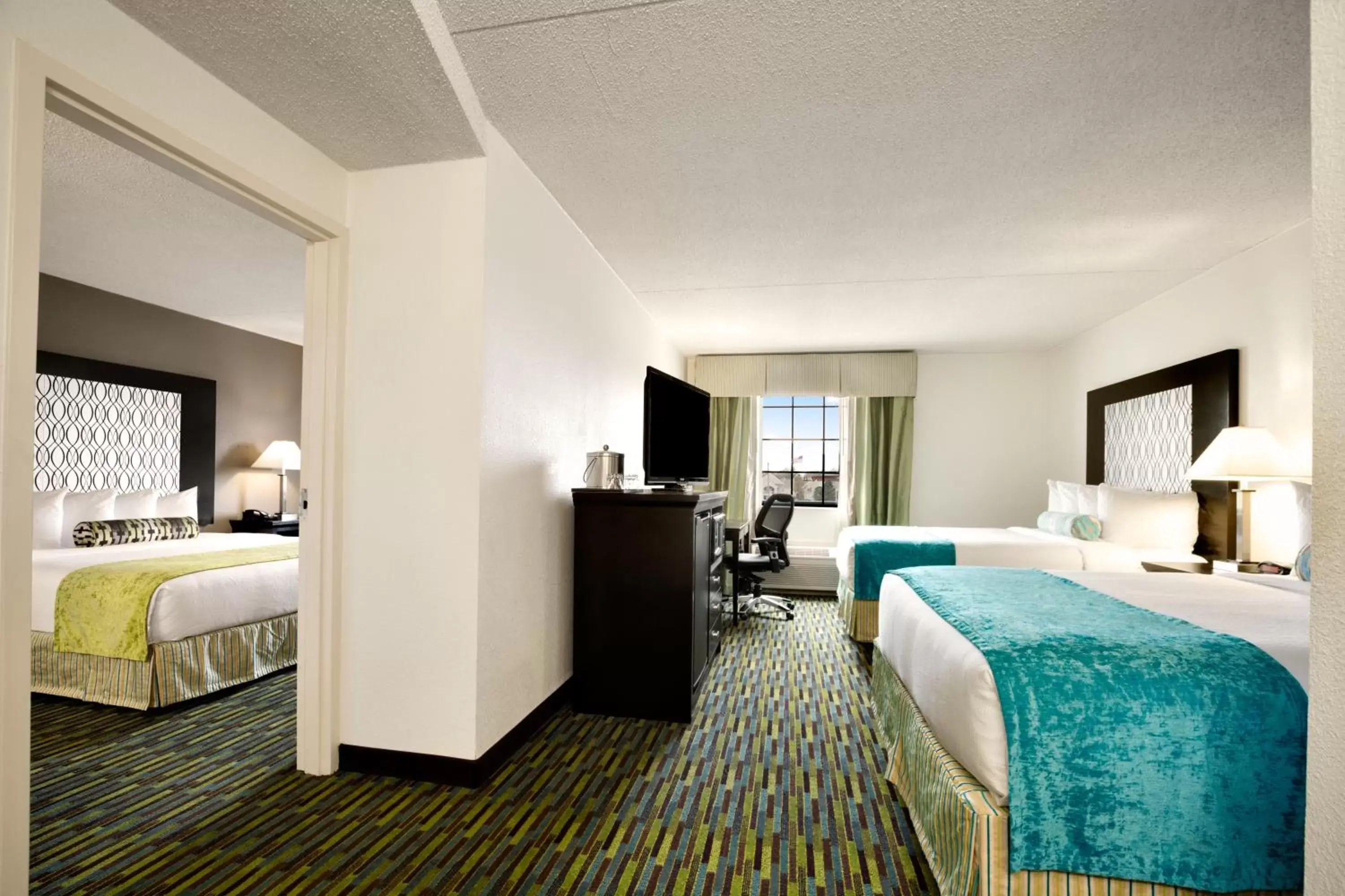 Photo of the whole room, Bed in Wyndham Garden Wichita Downtown