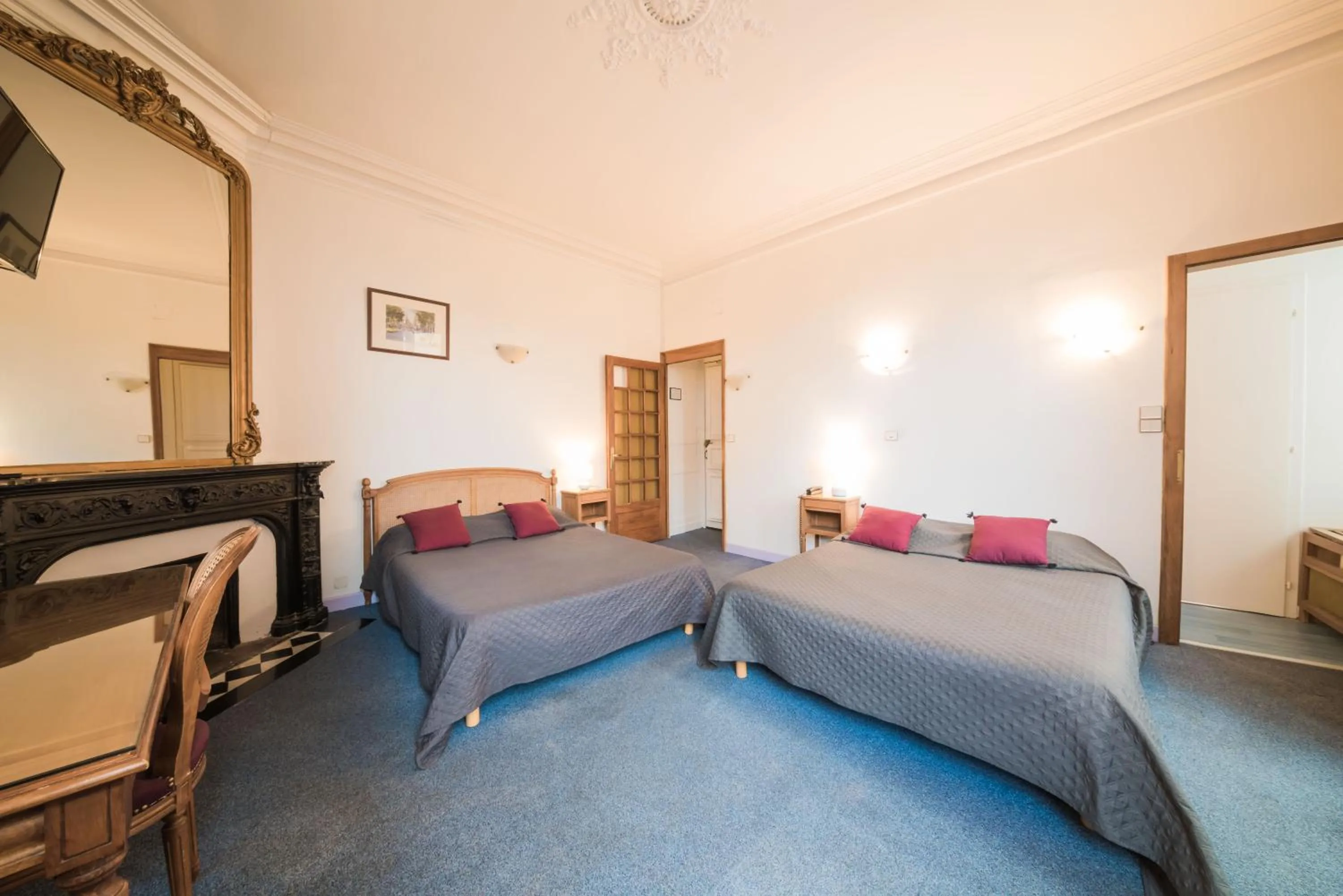 Bedroom in Hôtel du Centre