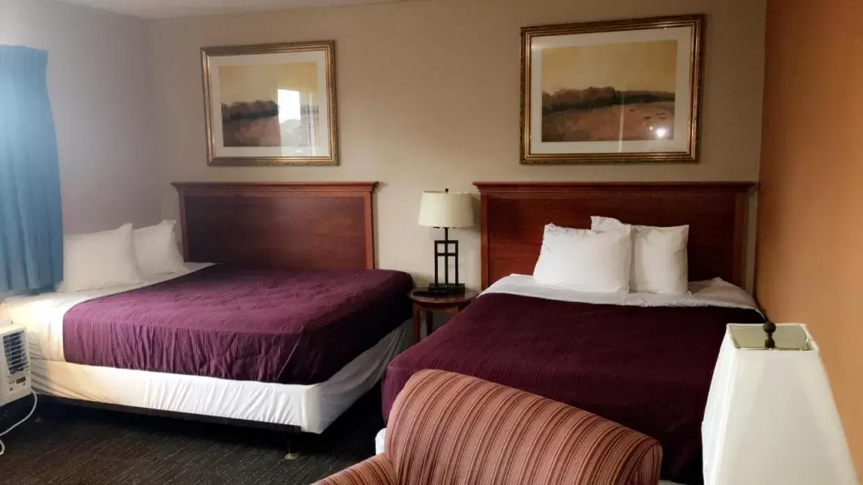 Bed in Rodeway Inn Sergeant Bluff - Sioux City