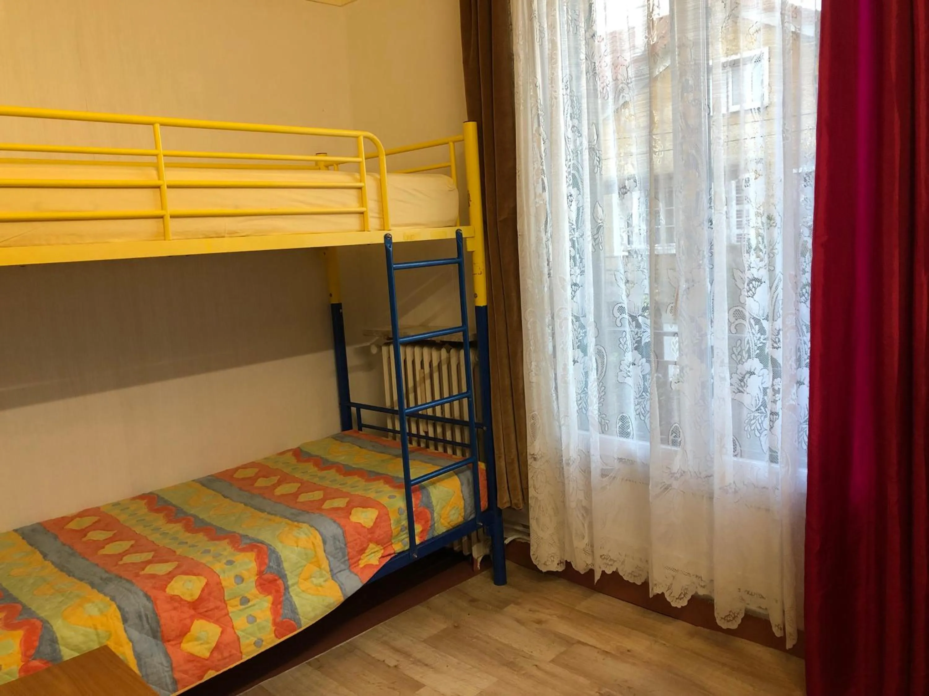 Bed in Hotel Paris Star