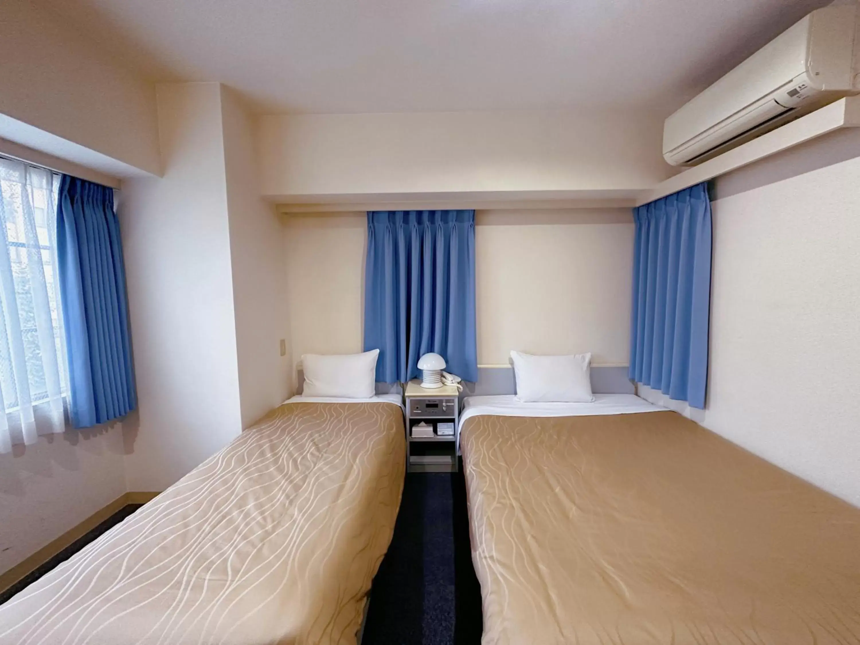 Photo of the whole room, Bed in Nissei Hotel Fukuoka