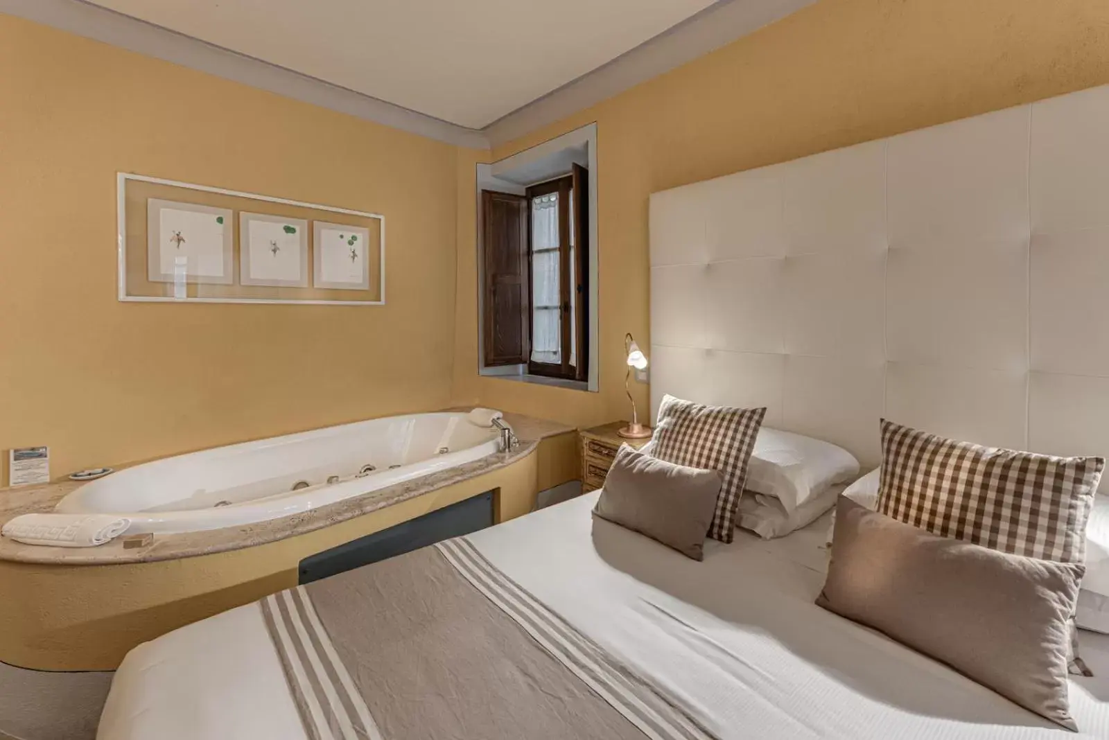 Bed in PALAZZO DEL CAPITANO Wellness & Relais - Luxury Borgo Capitano Collection