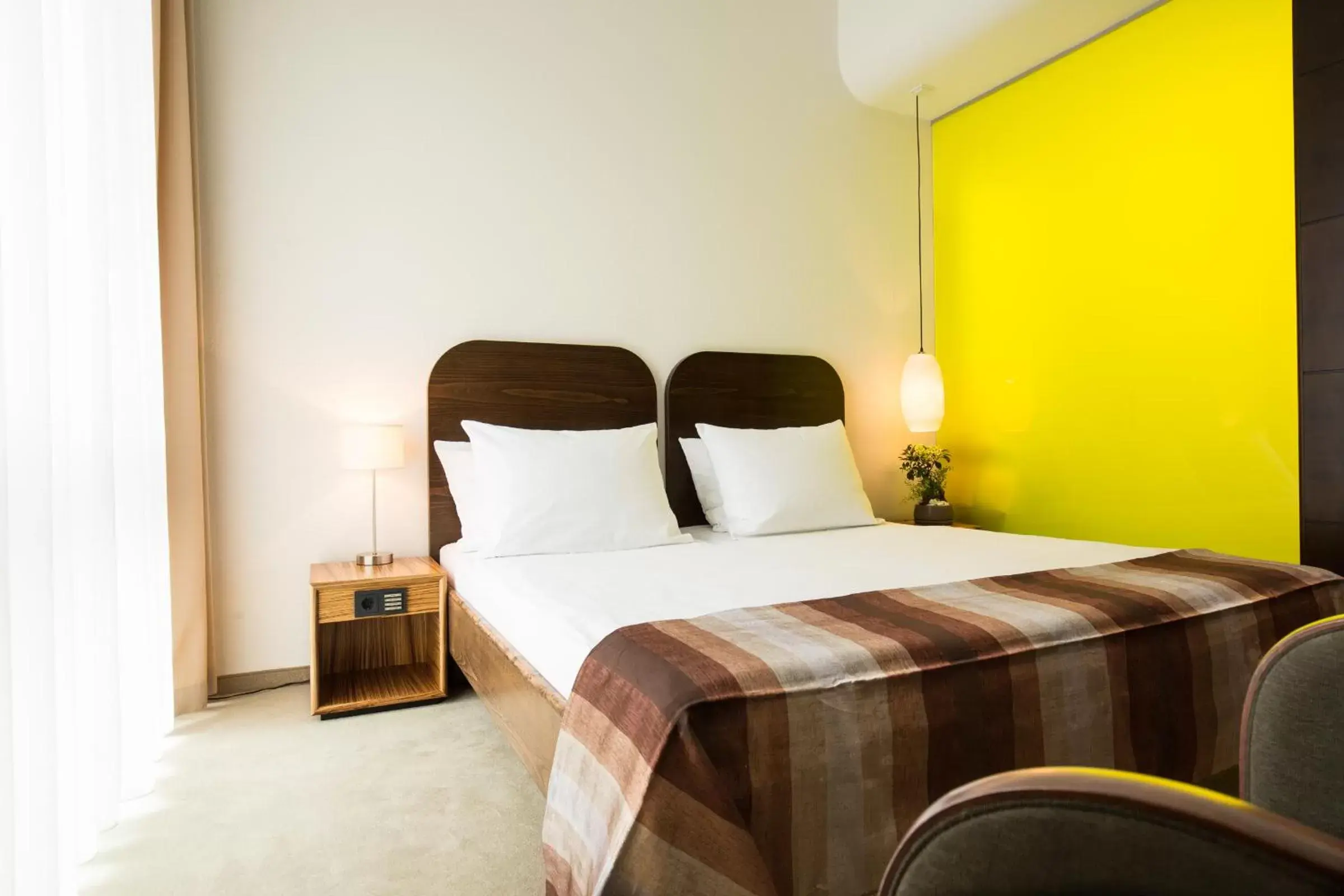 Photo of the whole room, Bed in ACHAT Hotel Corbin München Airport
