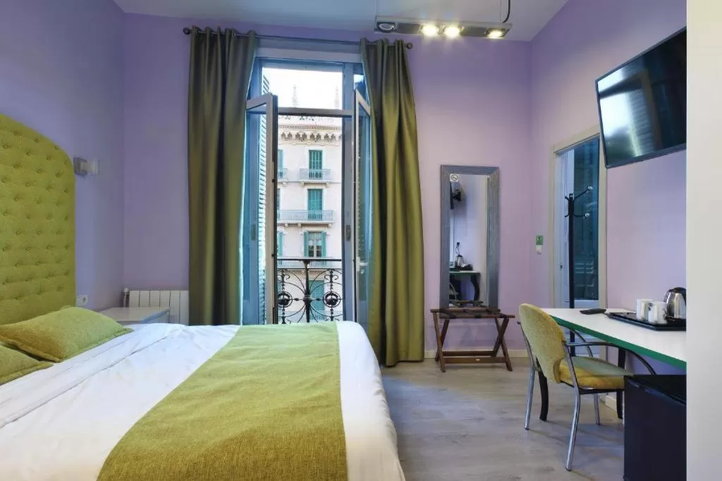 Bed in Hotel Ginebra