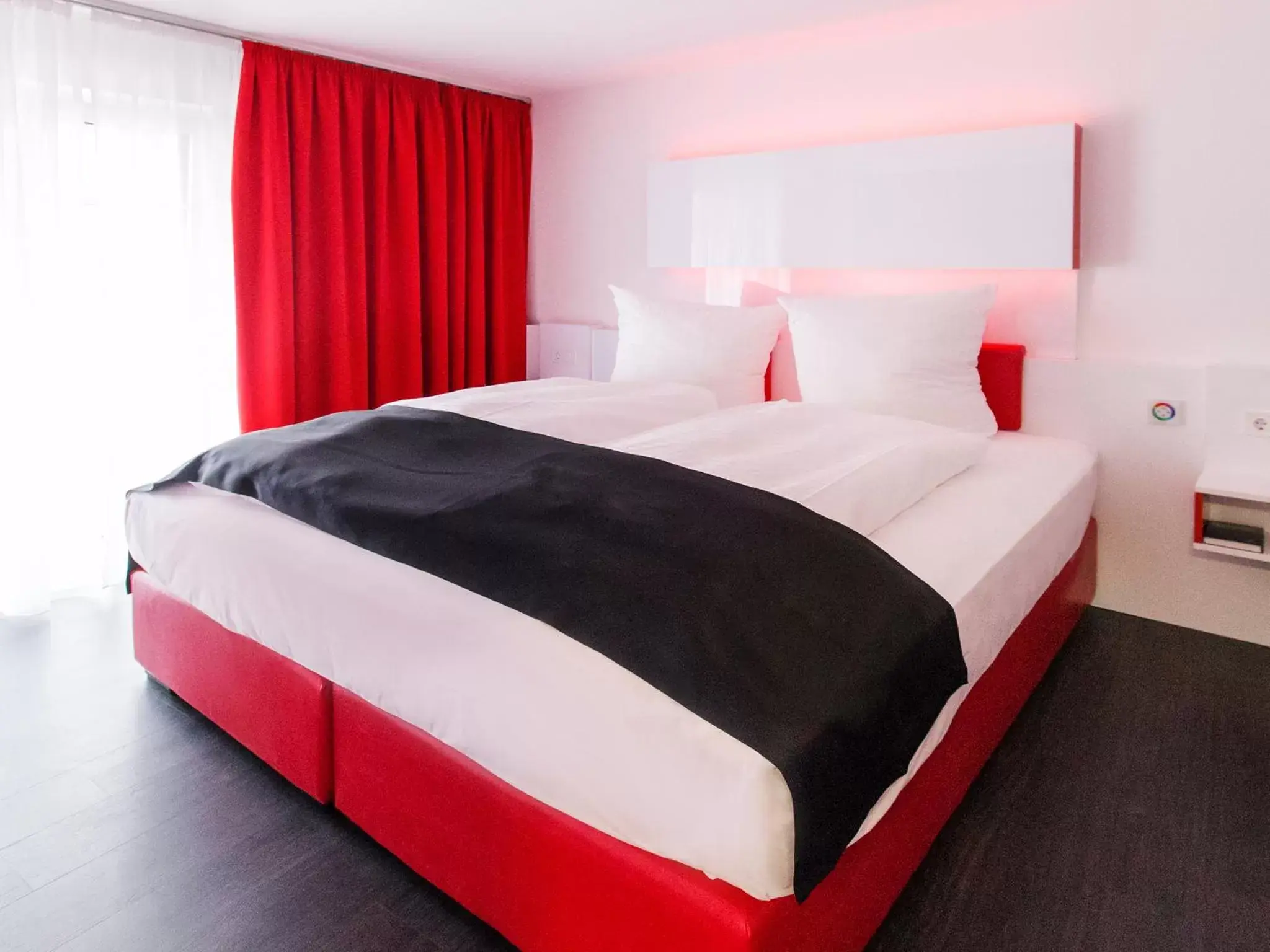 Photo of the whole room, Bed in DORMERO Hotel Villingen-Schwenningen