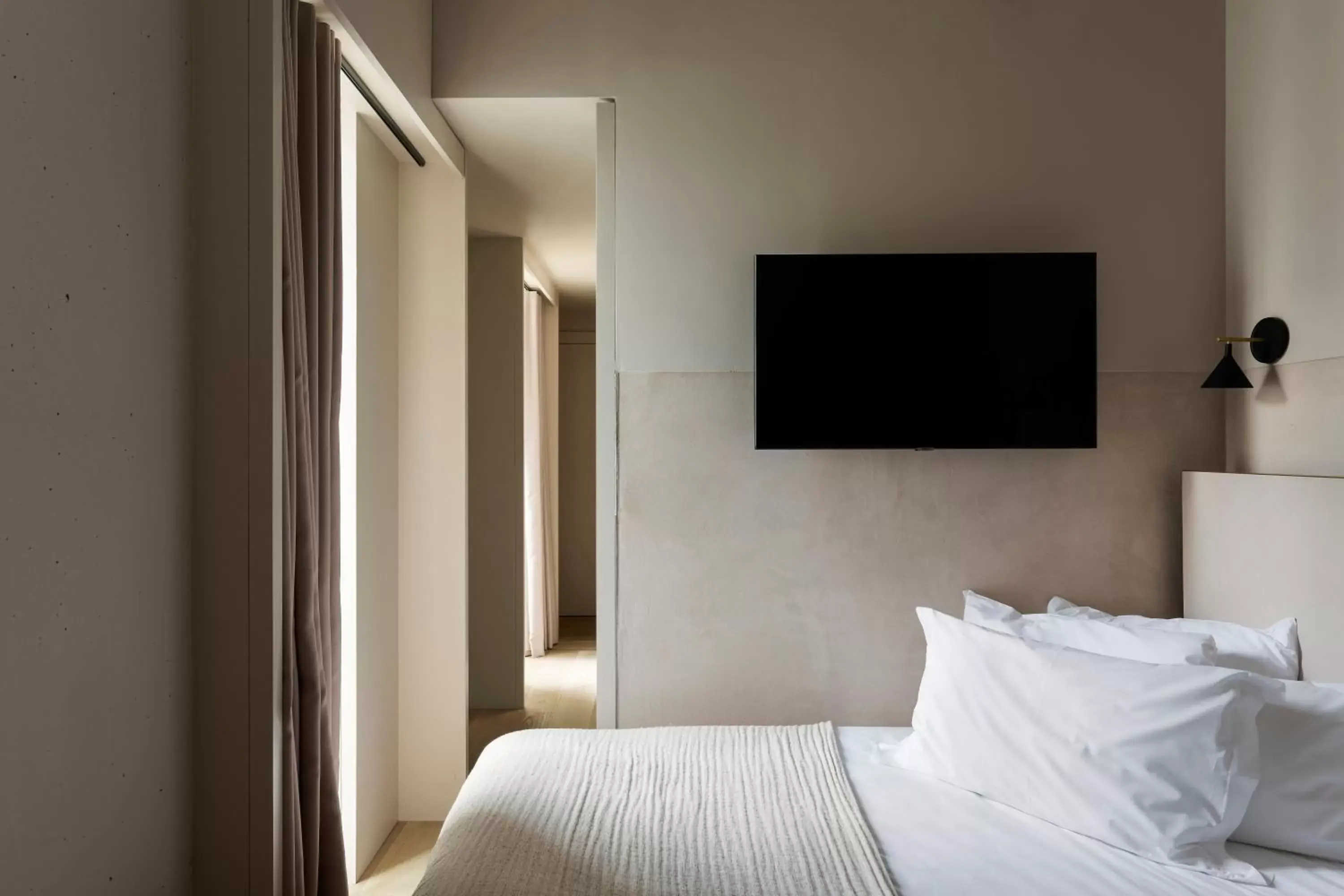 Bed, TV/Entertainment Center in Buckle Street Studios by Locke