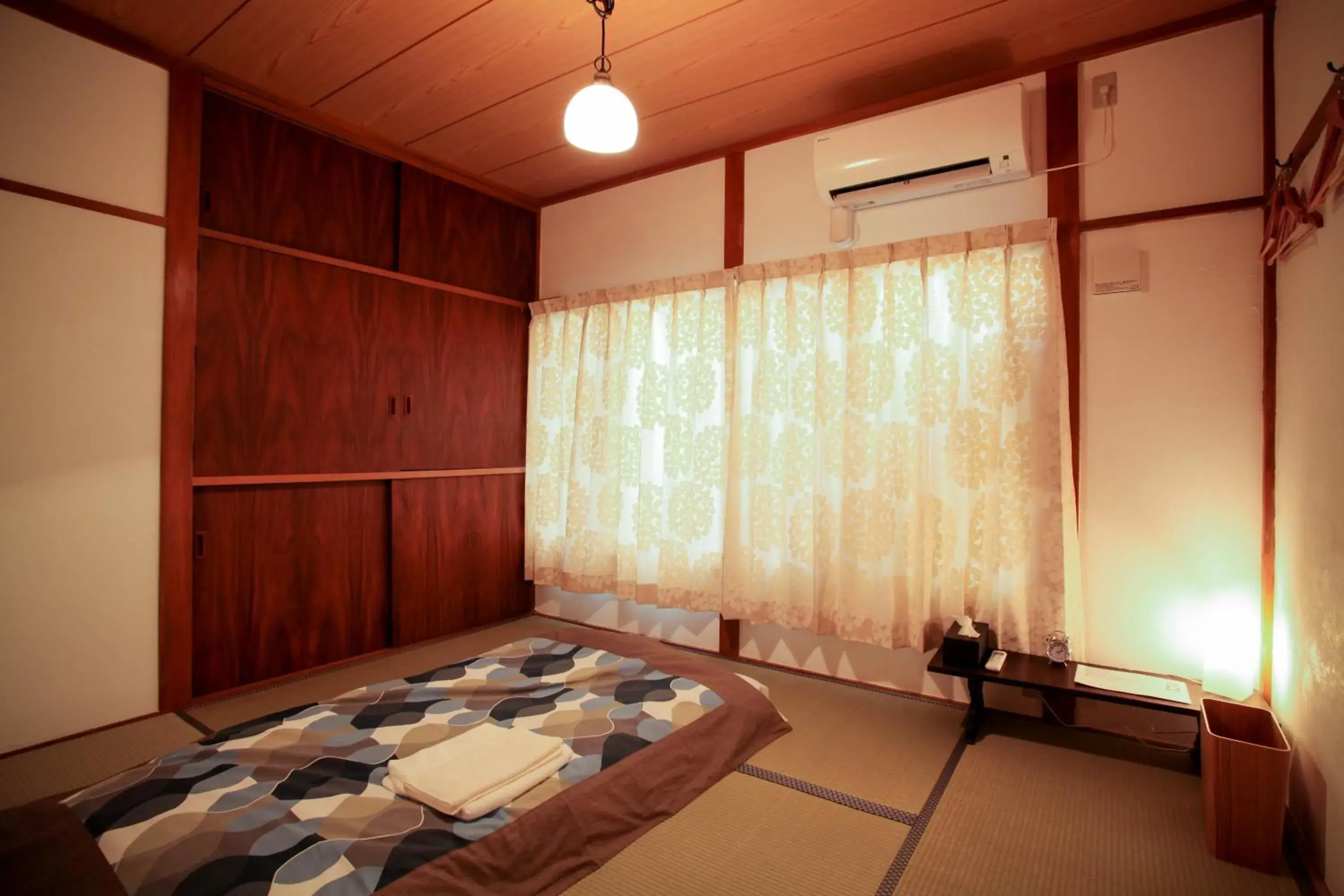 Photo of the whole room, Bed in Sheena and Ippei Guesthouse