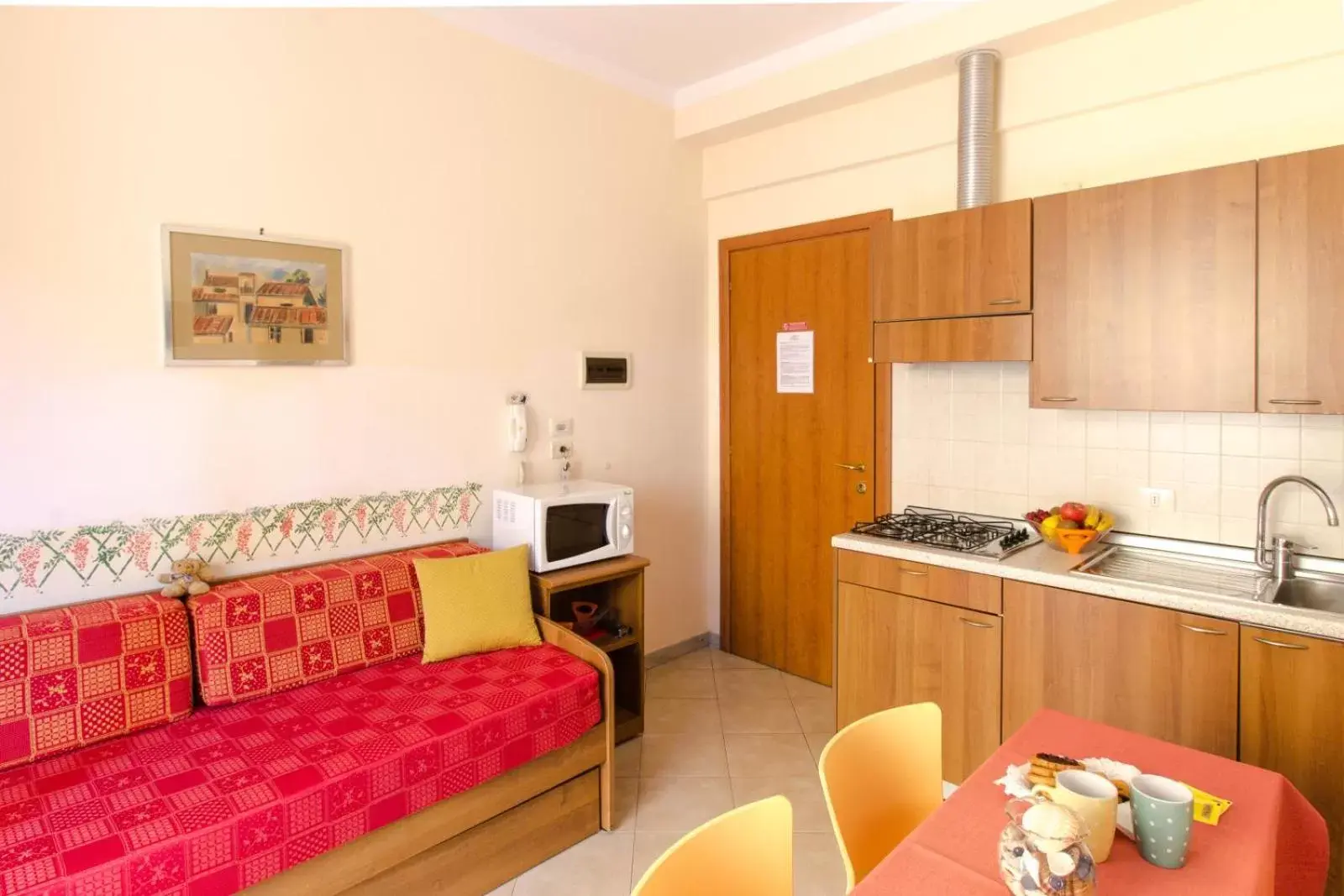 Dining area, Kitchen/Kitchenette in Casa Vacanze Isophylla