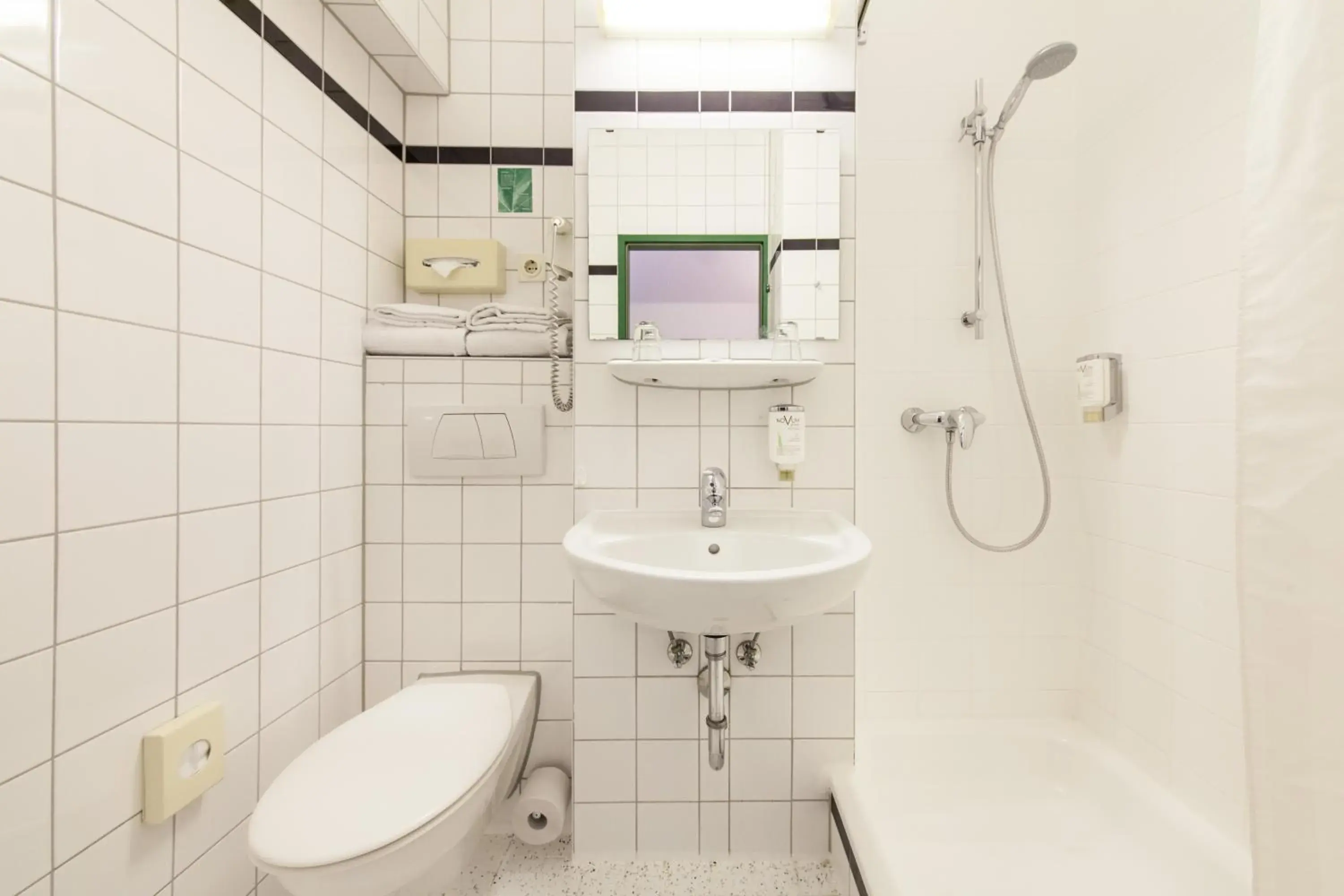 Bathroom in Sure Hotel by Best Western Muenchen Hauptbahnhof