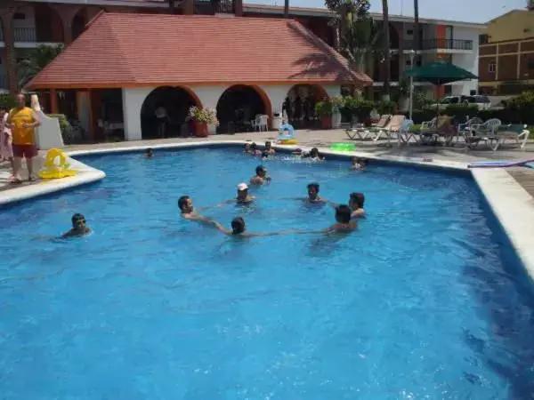 Swimming Pool in Costa Alegre Hotel & Suites