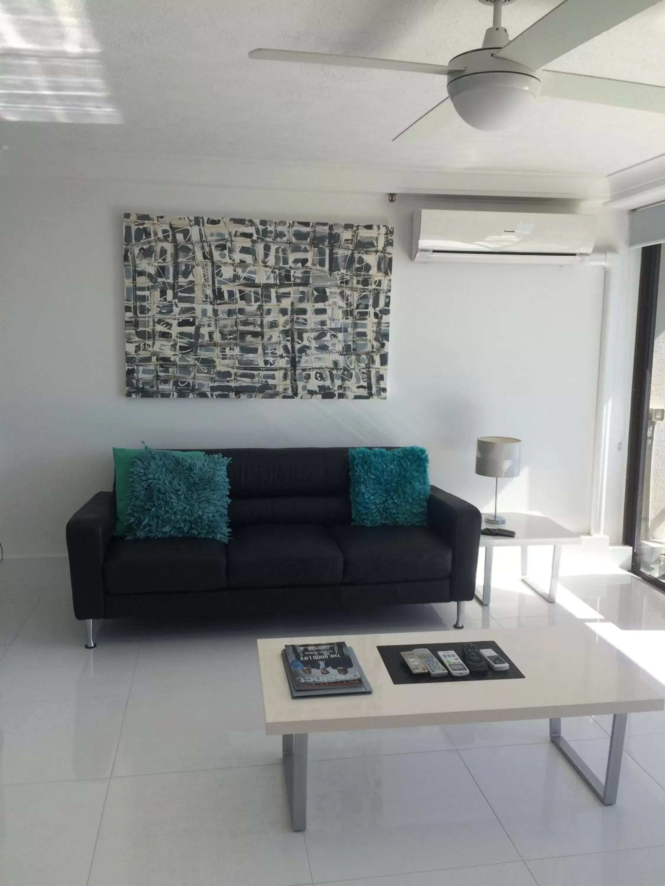 Living room, Seating Area in Surfers Century Oceanside Apartments