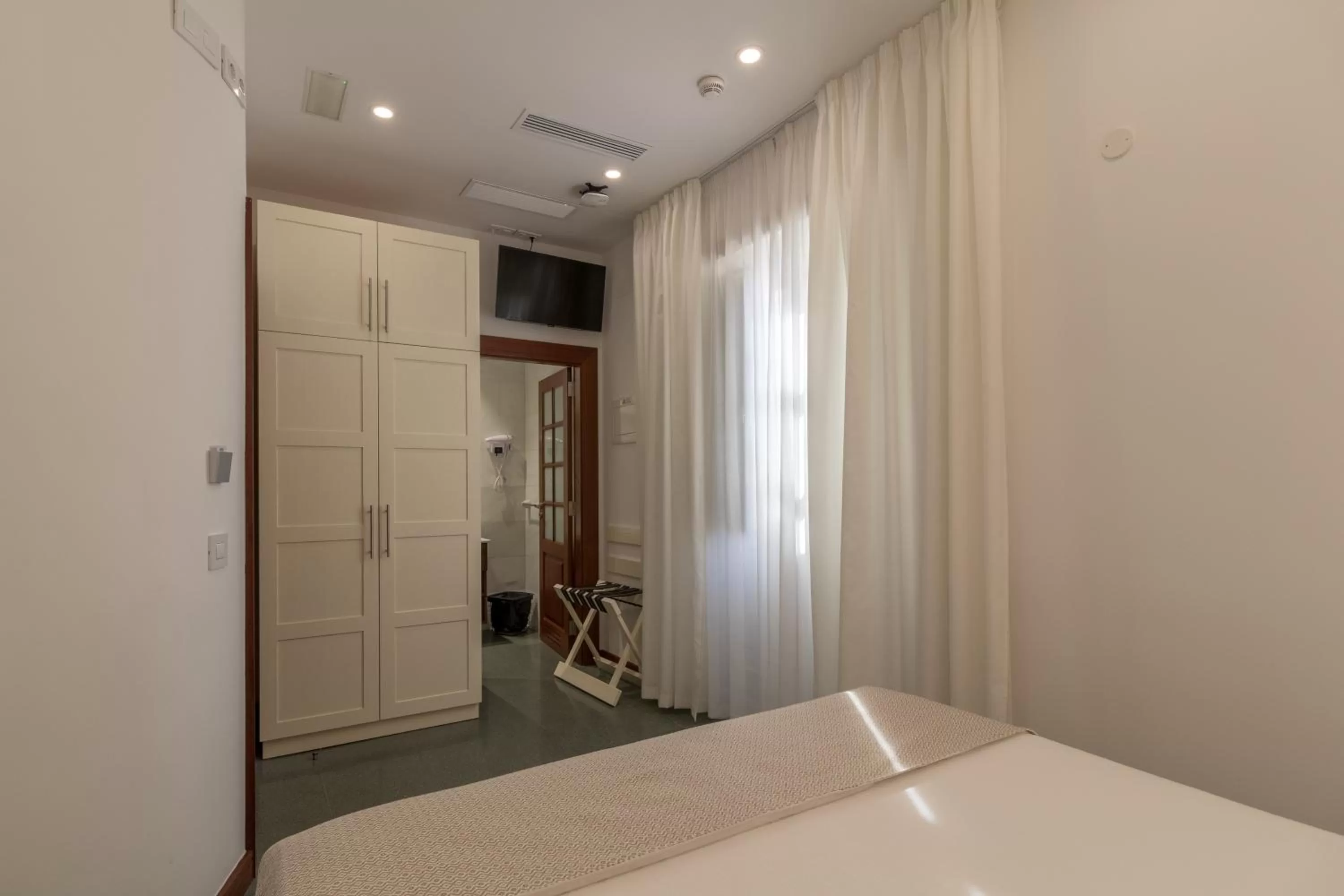 Photo of the whole room, Bed in Hotel Emblemático Holiday Time