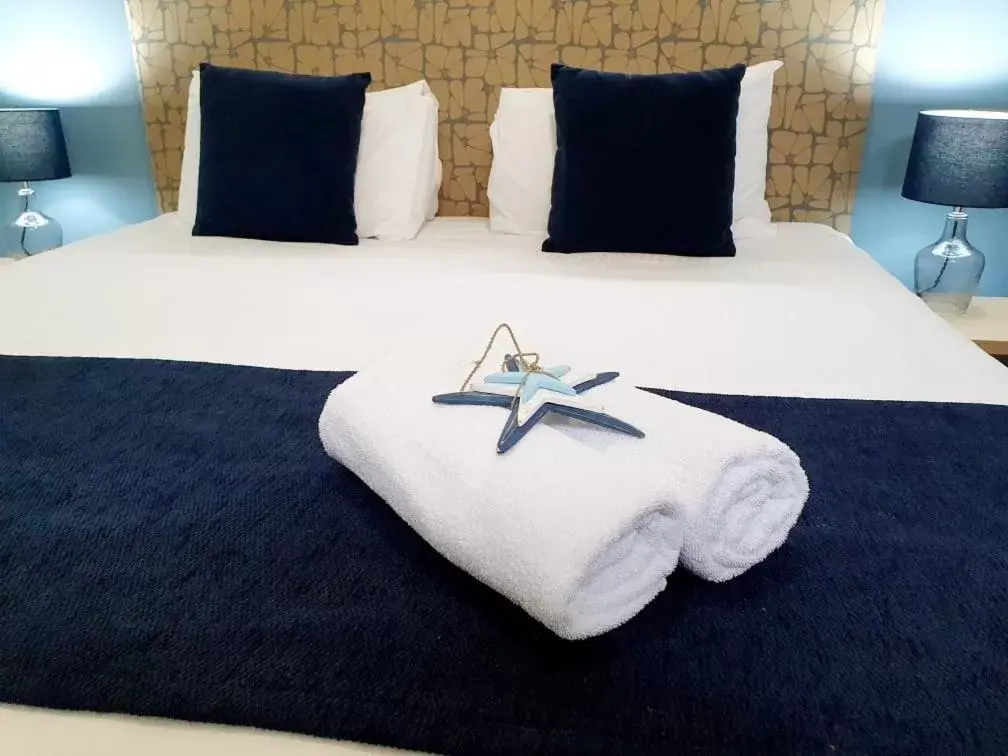 Bed in Korora Bay Village Resort