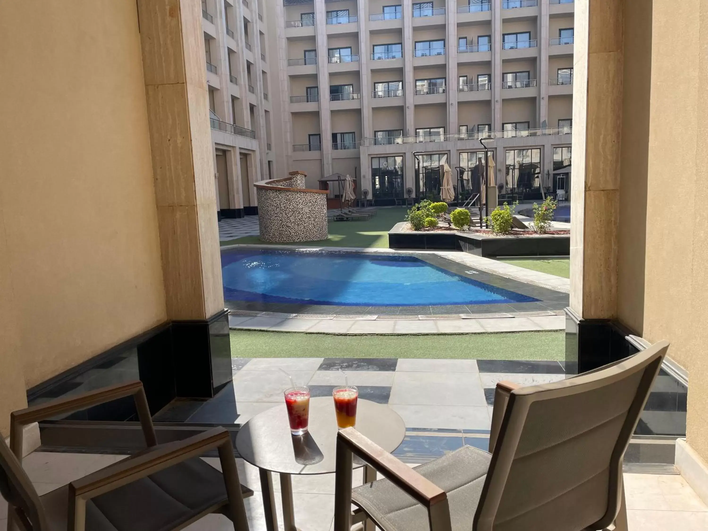 Photo of the whole room, Swimming Pool in Triumph Luxury Hotel